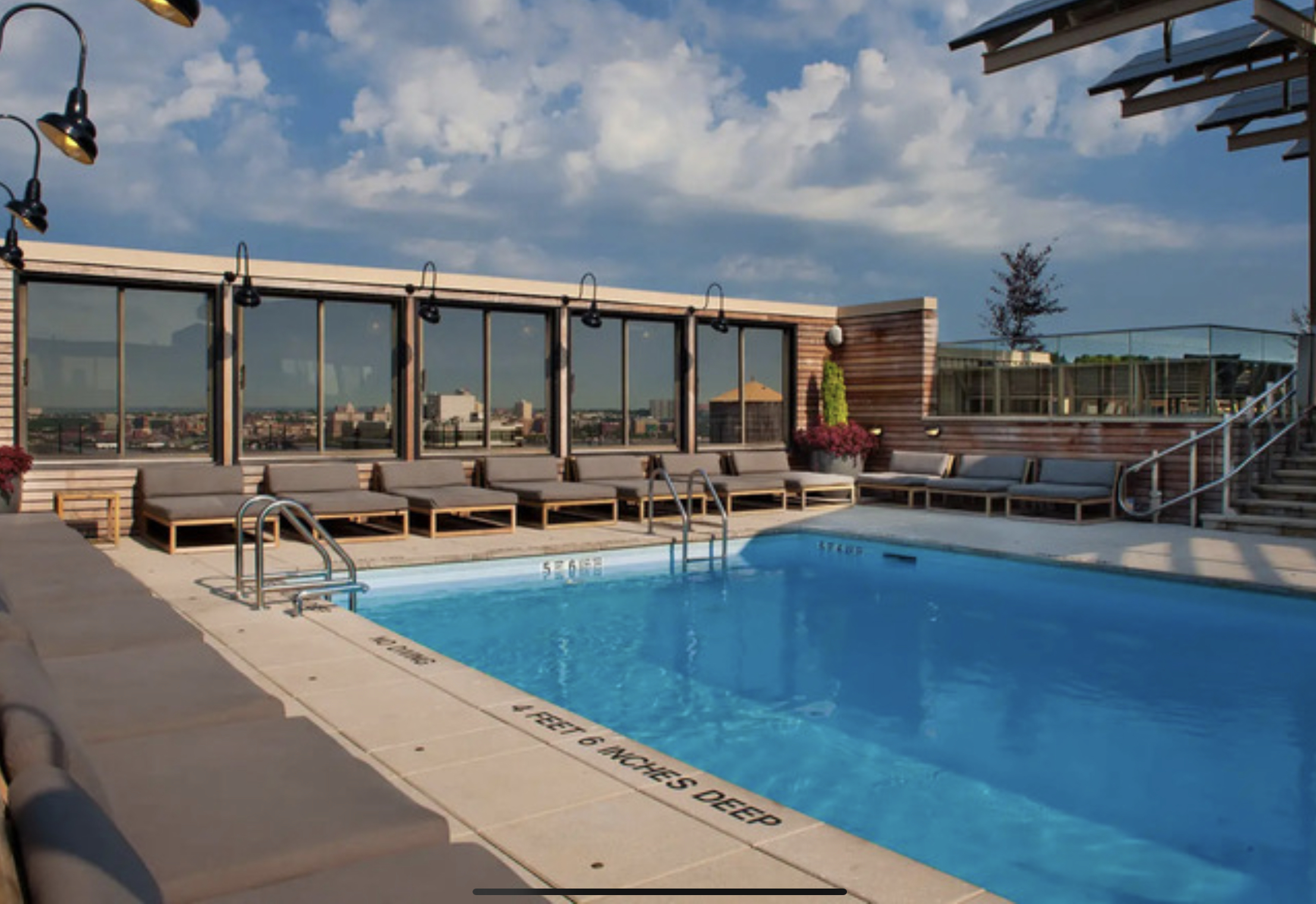 421 Hudson Street, Unit 502 Manhattan, NY 10014 - Photo 9 of 11 a outdoor space with swimming pool and furniture
