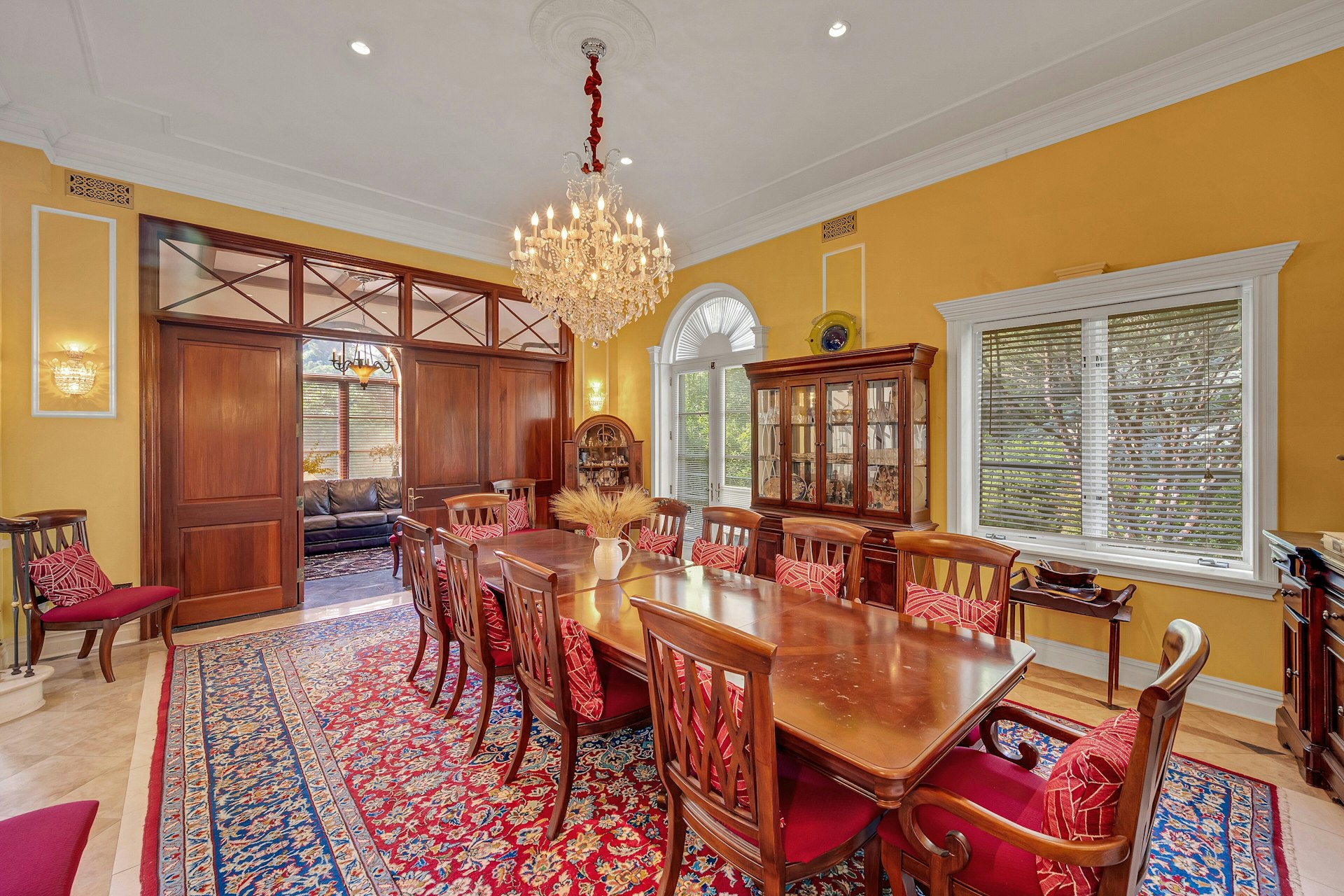 5440 Independence Avenue Bronx, NY 10471 - Photo 12 of 36 a view of a dining room with furniture a chandelier and large window