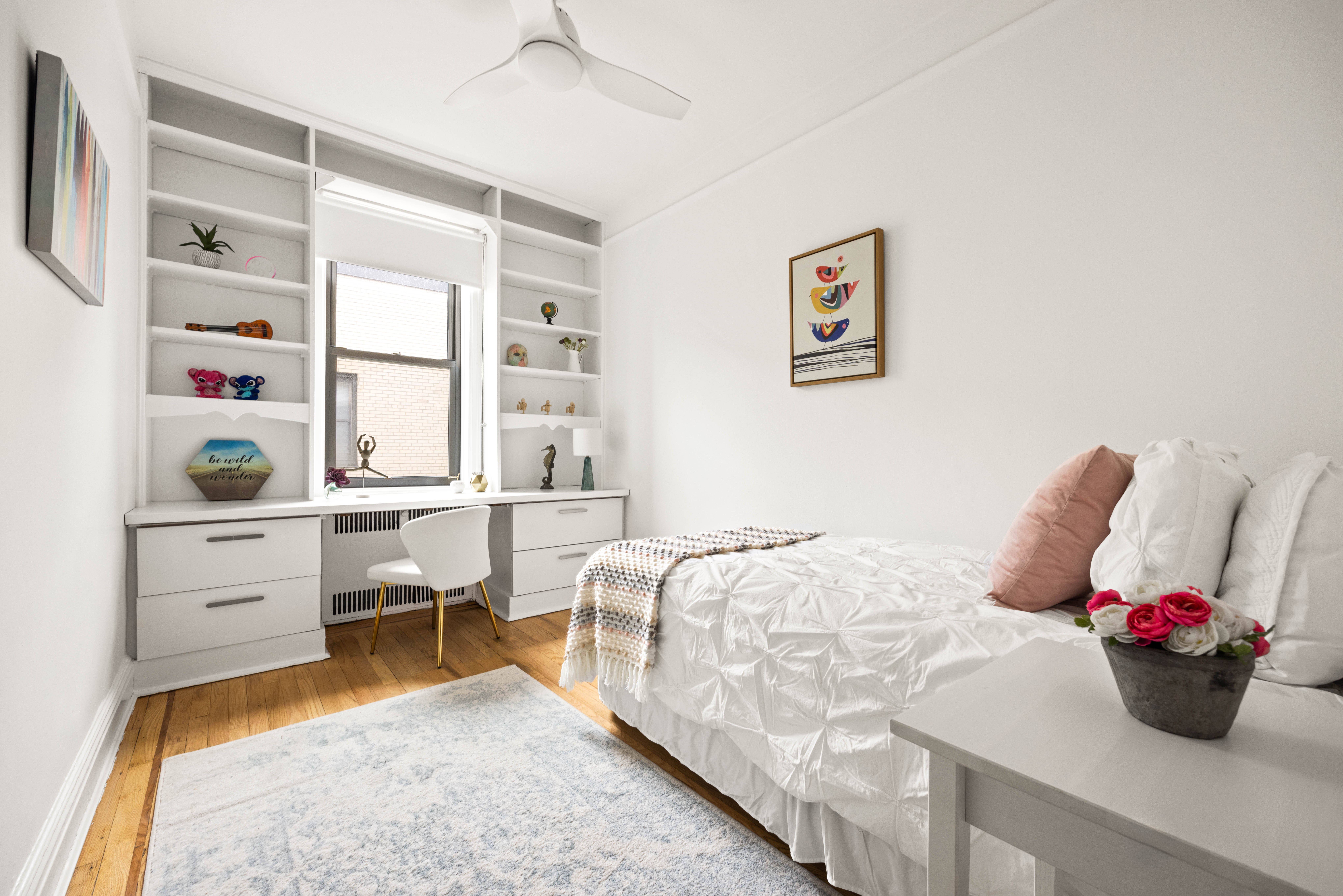 30 Ocean Parkway, Unit 6G Brooklyn, NY 11218 - Photo 11 of 18 a bedroom with a bed and a large window