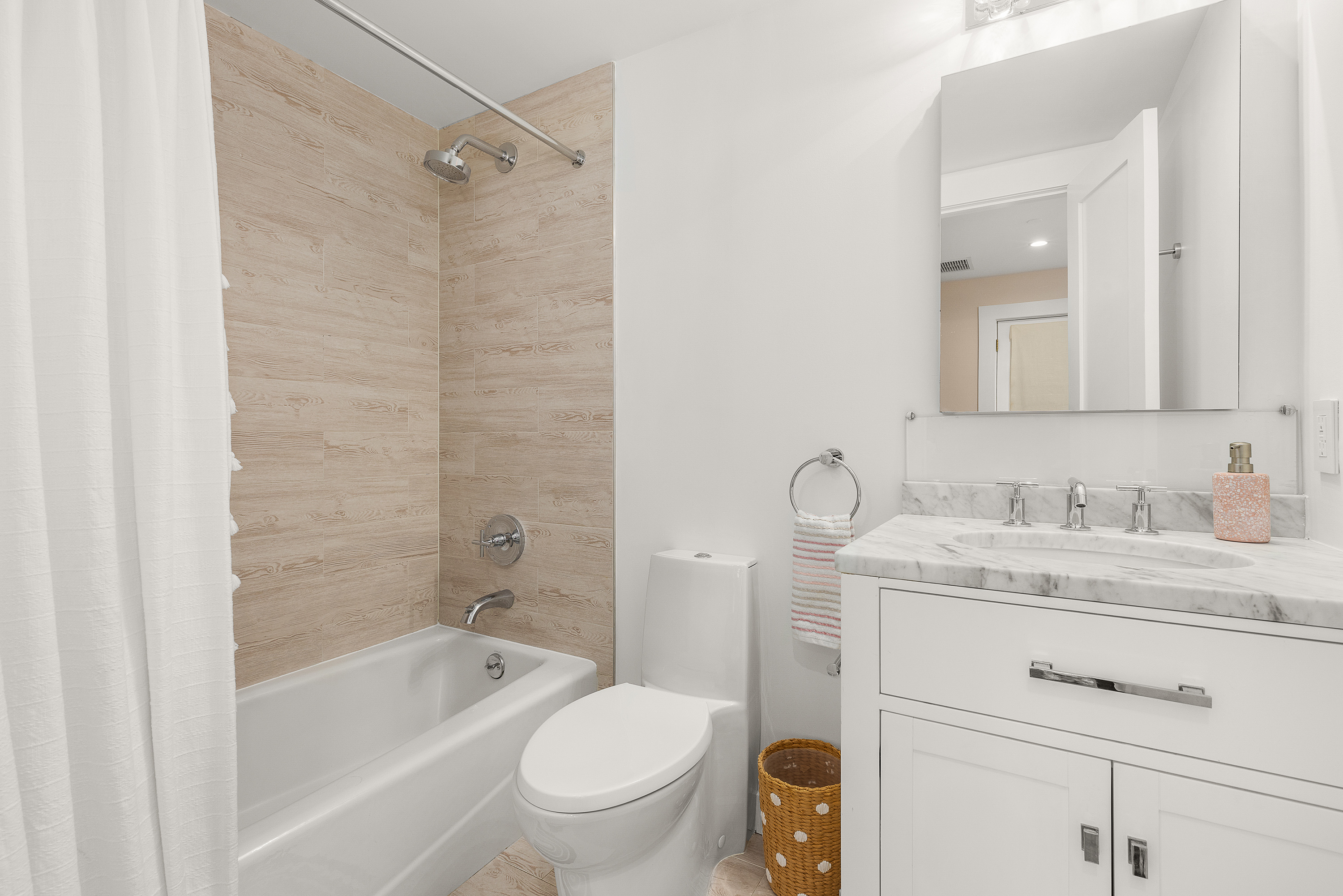 330 Bond Street Brooklyn, NY 11231 - Photo 12 of 18 a bathroom with a granite countertop sink a toilet and shower