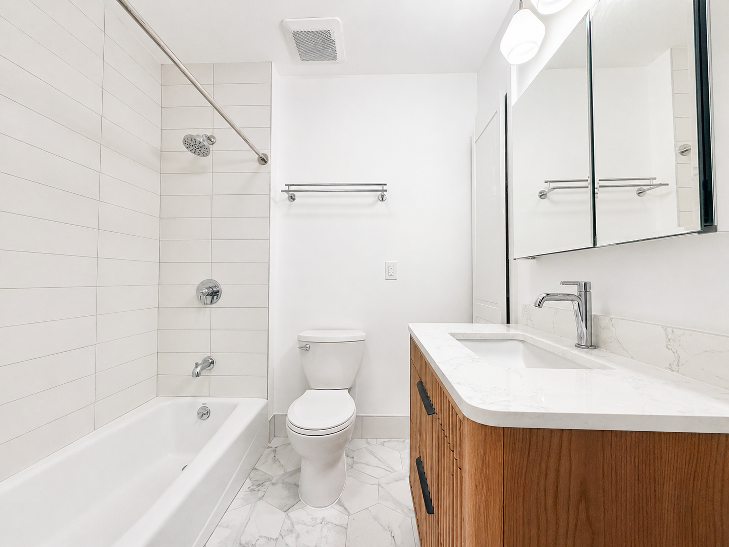 72 2nd Place, Unit 1 Brooklyn, NY 11231 - Photo 8 of 11 a bathroom with a sink a toilet and bathtub