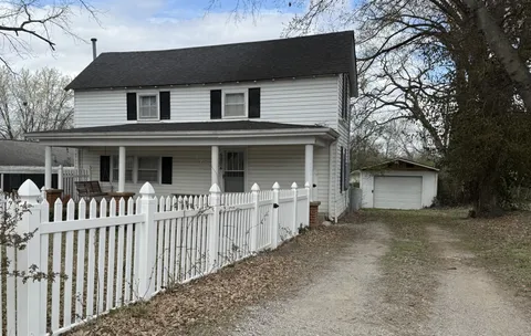 a front view of a house with balcony