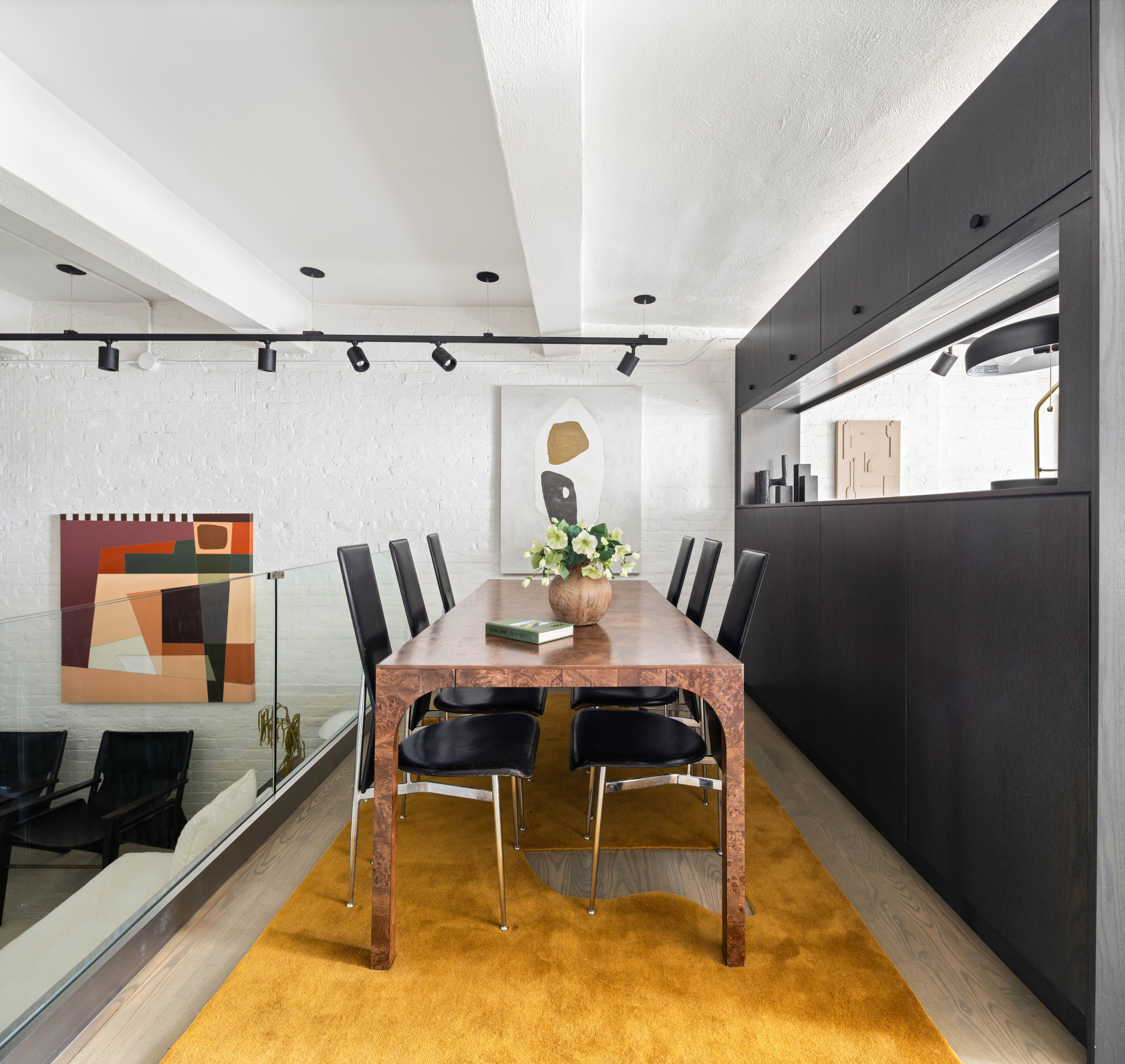 165 Perry Street, Unit 1D Manhattan, NY 10014 - Photo 3 of 13 a view of a dining room with furniture