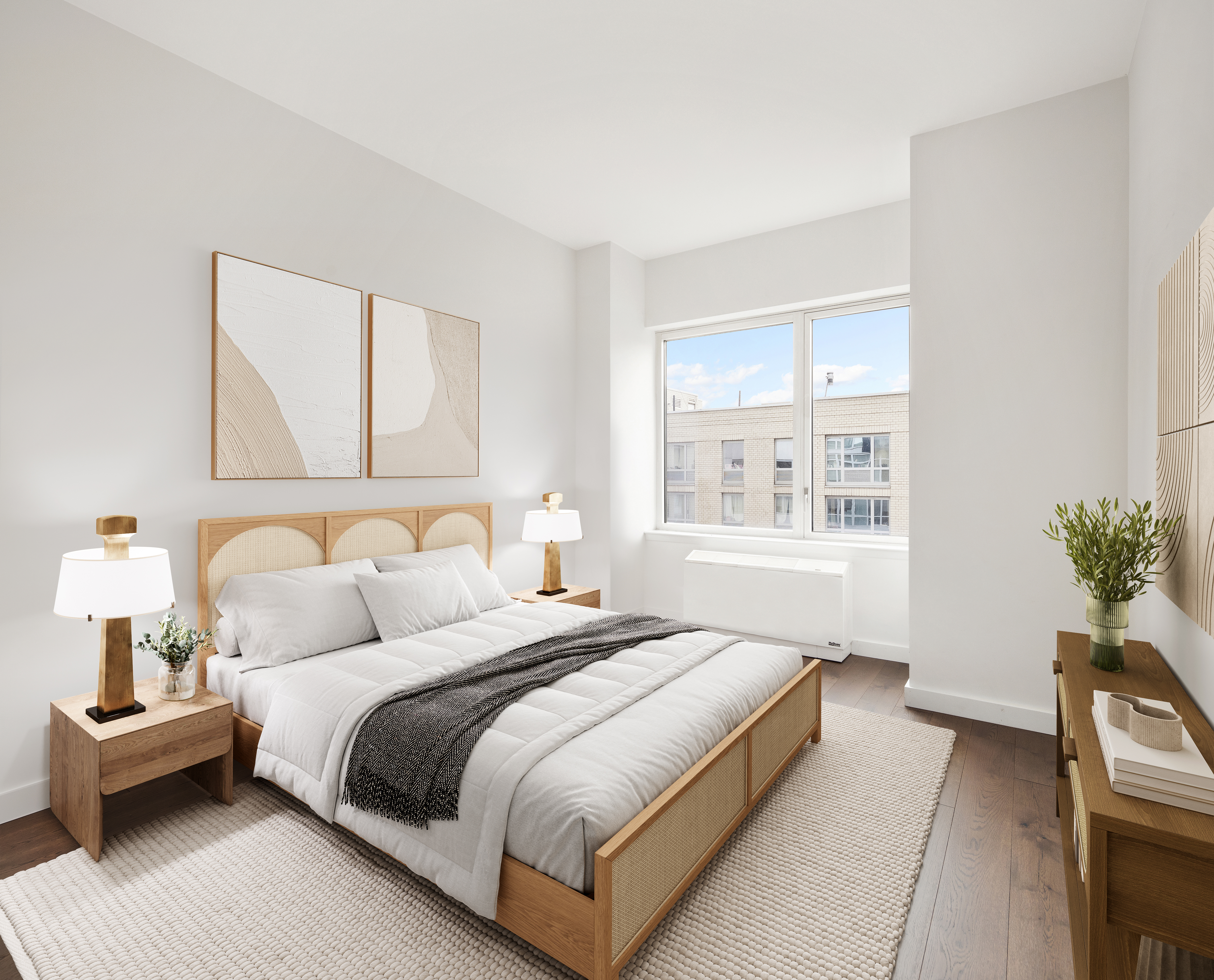 22 North 6th Street, Unit 9L Brooklyn, NY 11249 - Photo 4 of 6 a bedroom with a bed and wooden floor