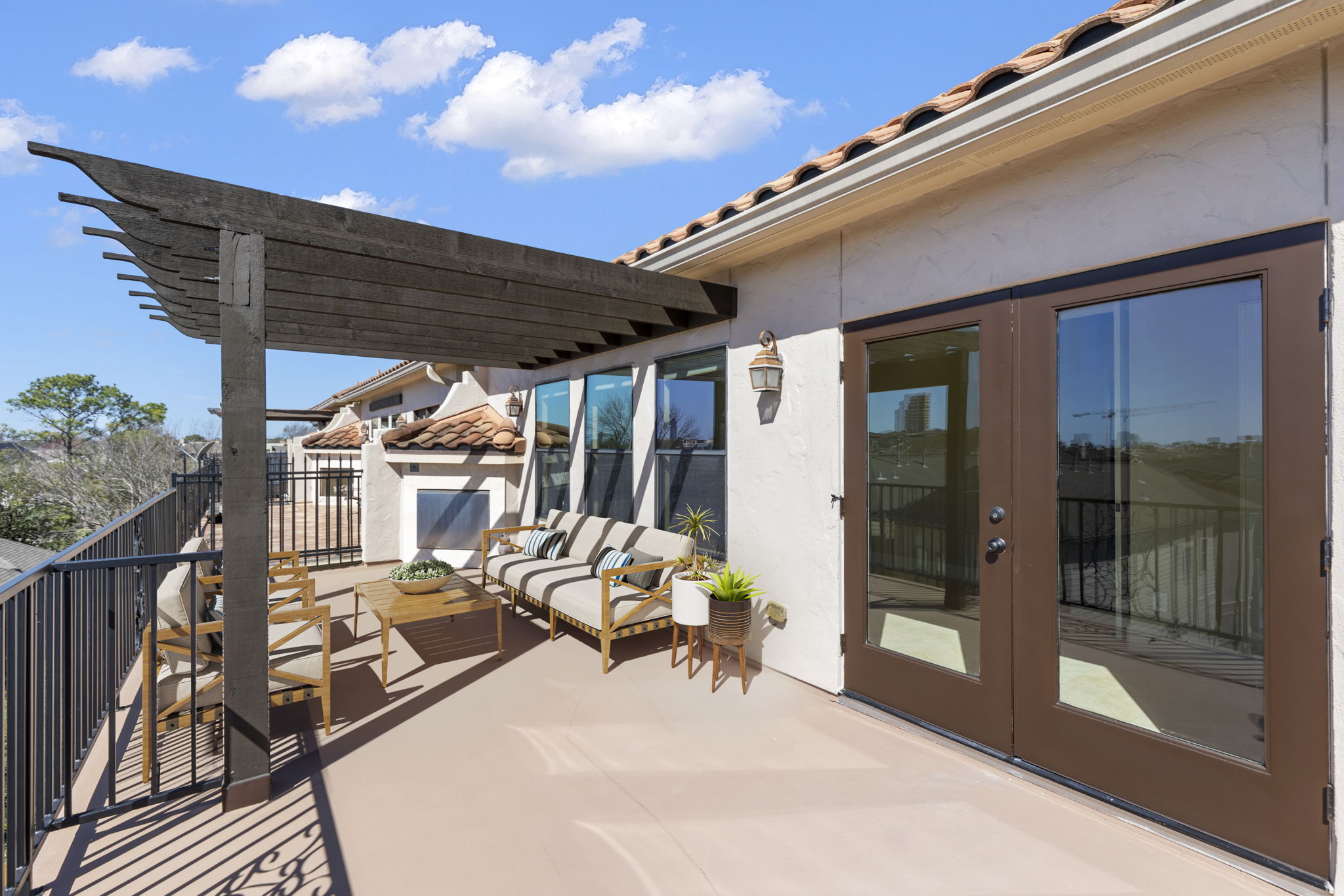 5407 Feagan Street Houston, TX 77007 - Photo 40 of 43 a view of a patio with couches chairs and wooden floor