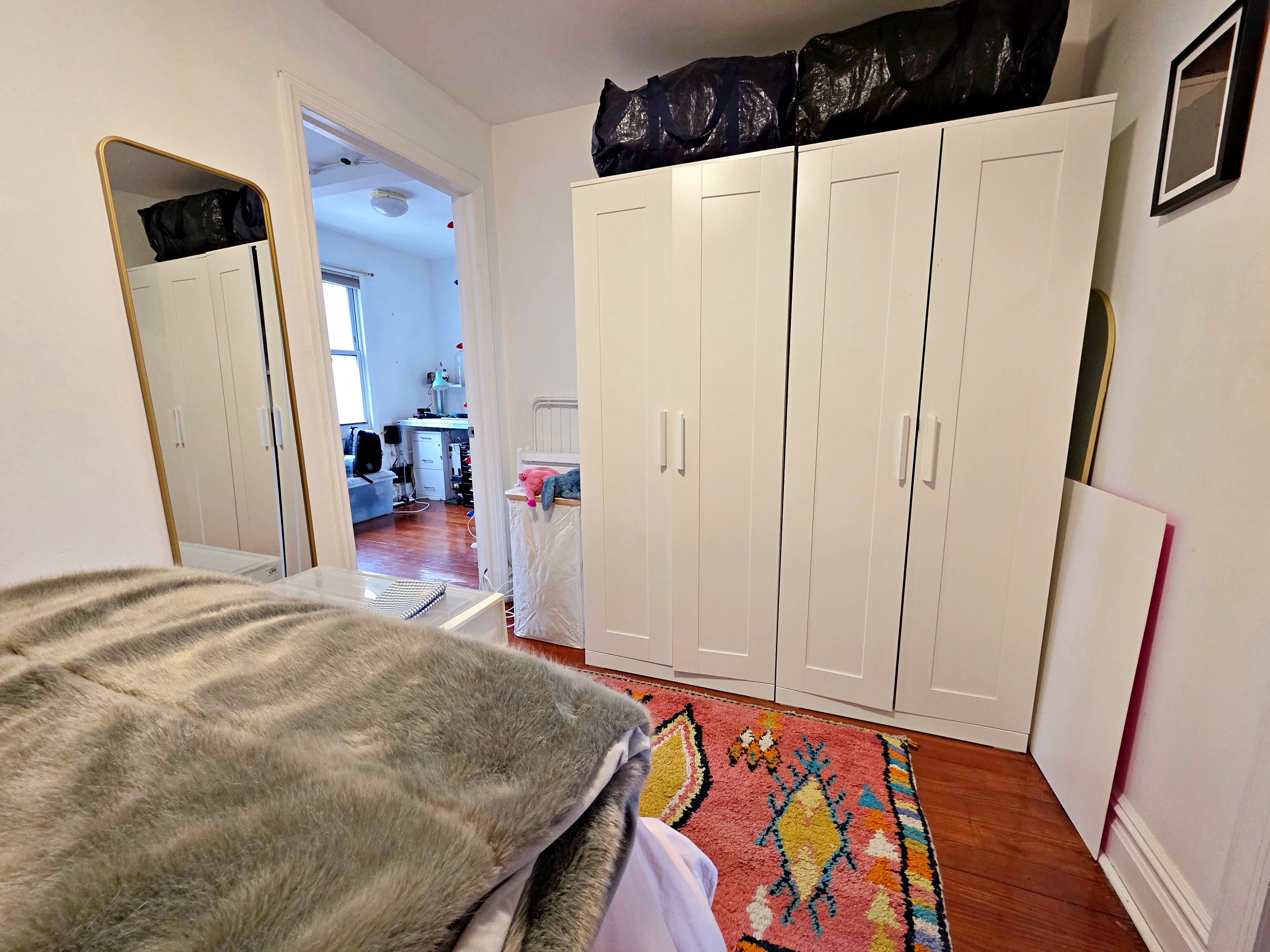 214 Devoe Street, Unit 2 Brooklyn, NY 11211 - Photo 5 of 8 a view of a hallway with hallway