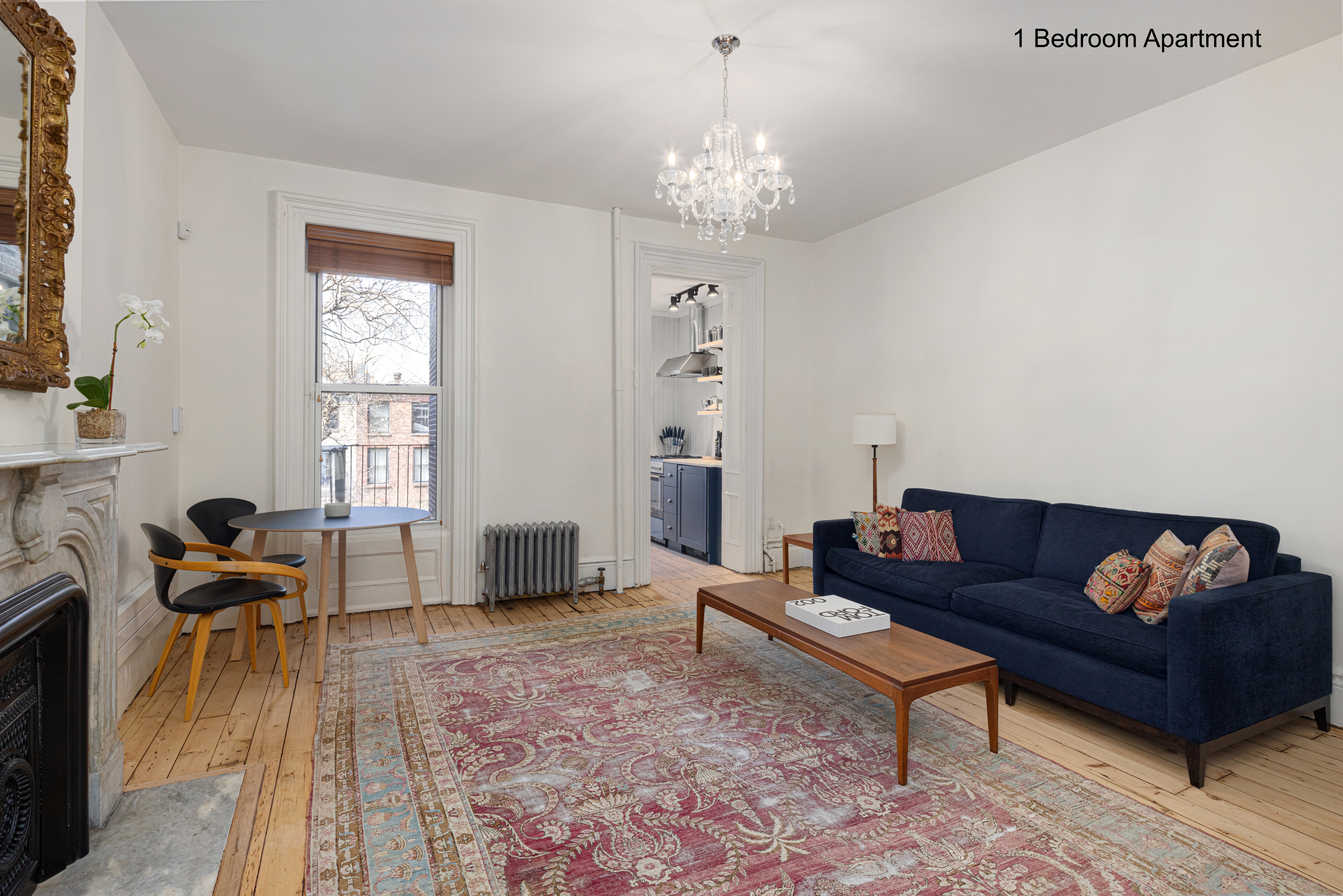 20 Strong Place Brooklyn, NY 11231 - Photo 7 of 21 a living room with furniture and a chandelier