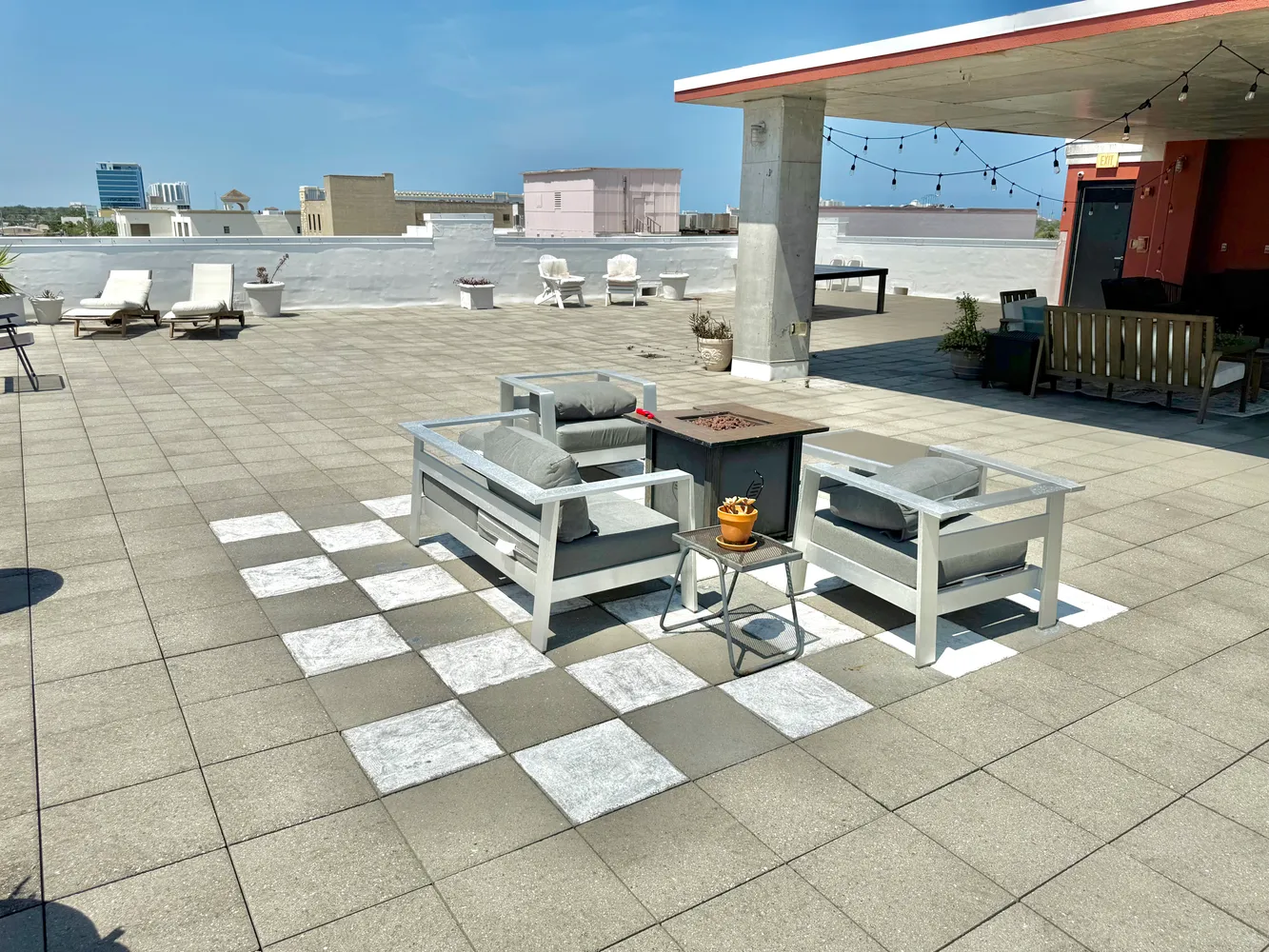 a view of a balcony with many chairs