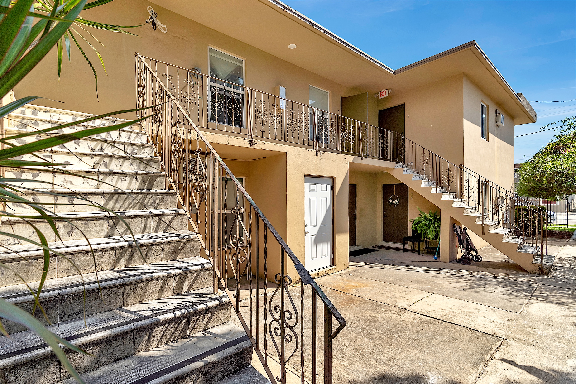 1361 Southwest 4th Street Miami, FL 33135 - Photo 4 of 23 a view of a house with wooden floor and a small yard