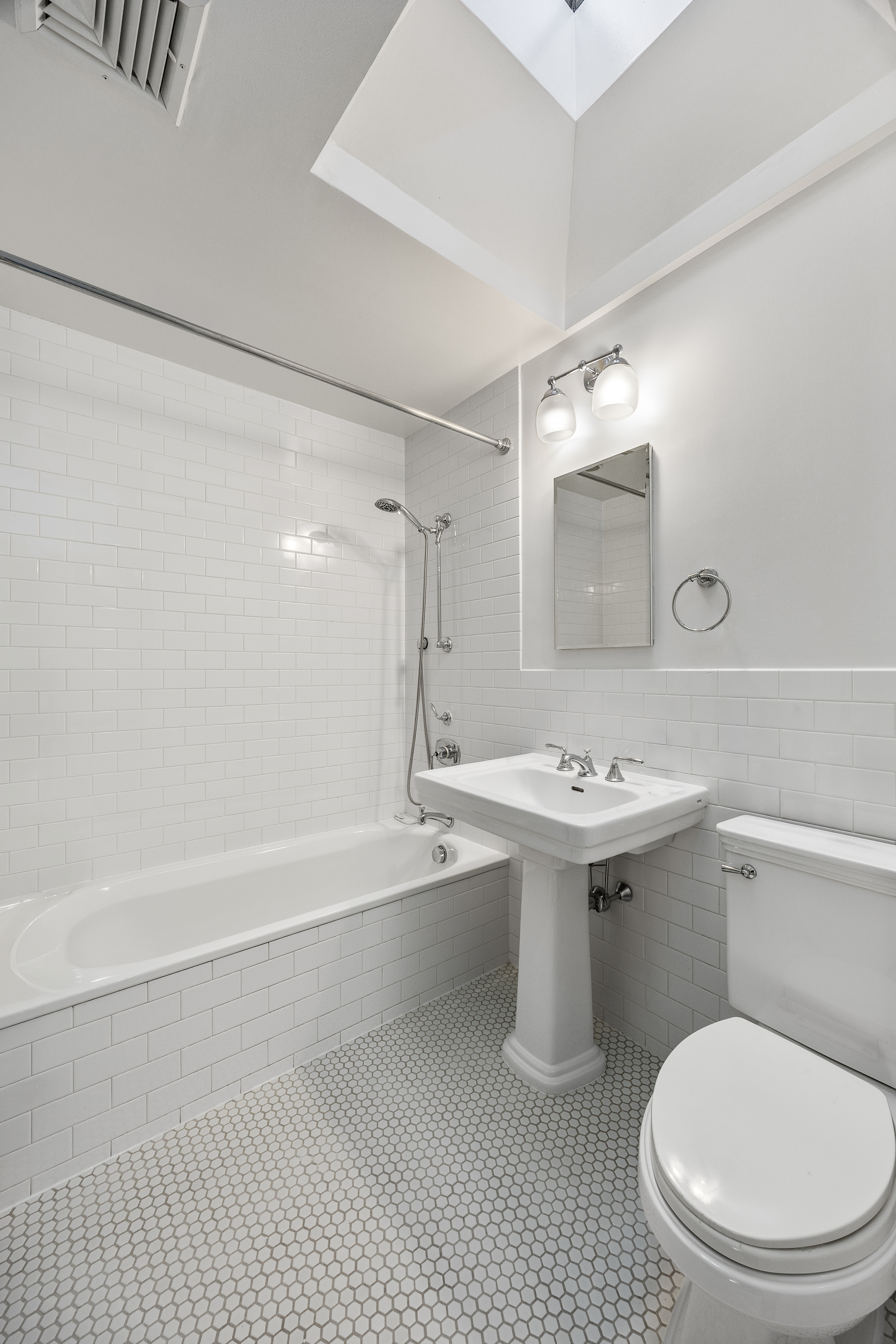 347 5th Street, Unit TWHS Brooklyn, NY 11215 - Photo 10 of 13 a bathroom with a sink a toilet and shower