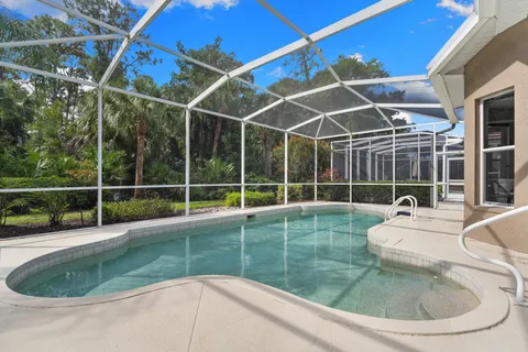 $995,000 | 1717 Winding Oaks Way, Naples, FL 34109