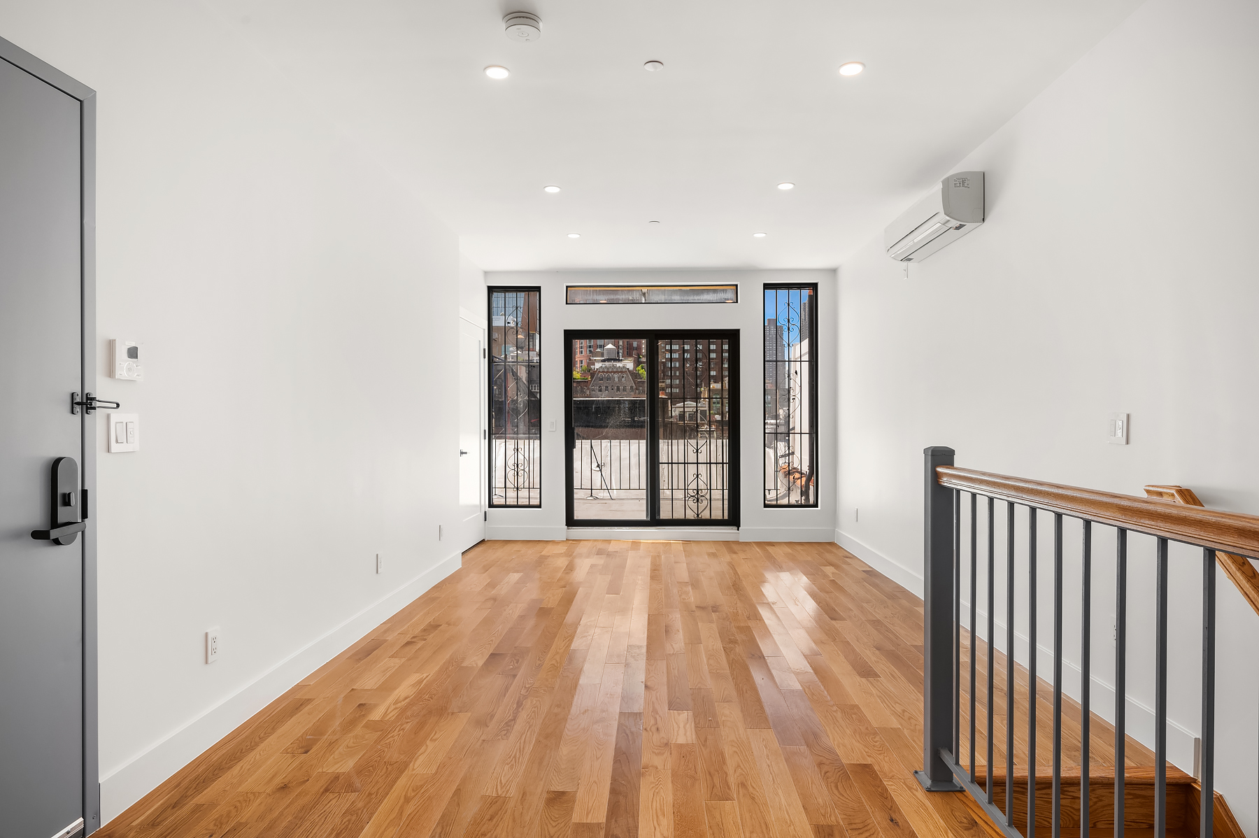 61 West 70th Street, Unit PH Manhattan, NY 10023 - Photo 4 of 18 a view of empty room with wooden floor and fan