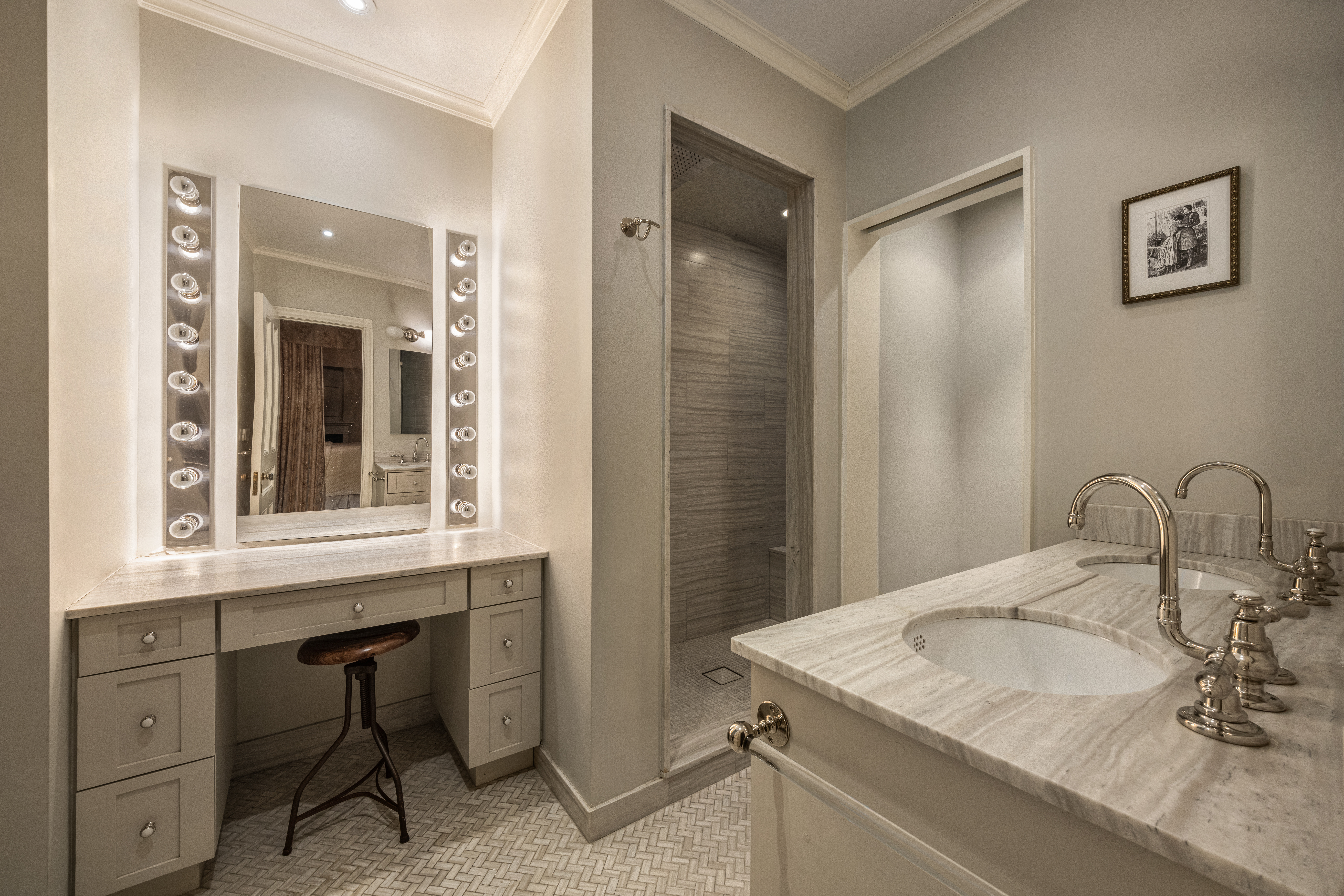 205 West 57th Street, Unit 4B Manhattan, NY 10019 - Photo 11 of 14 a bathroom with a sink and a mirror