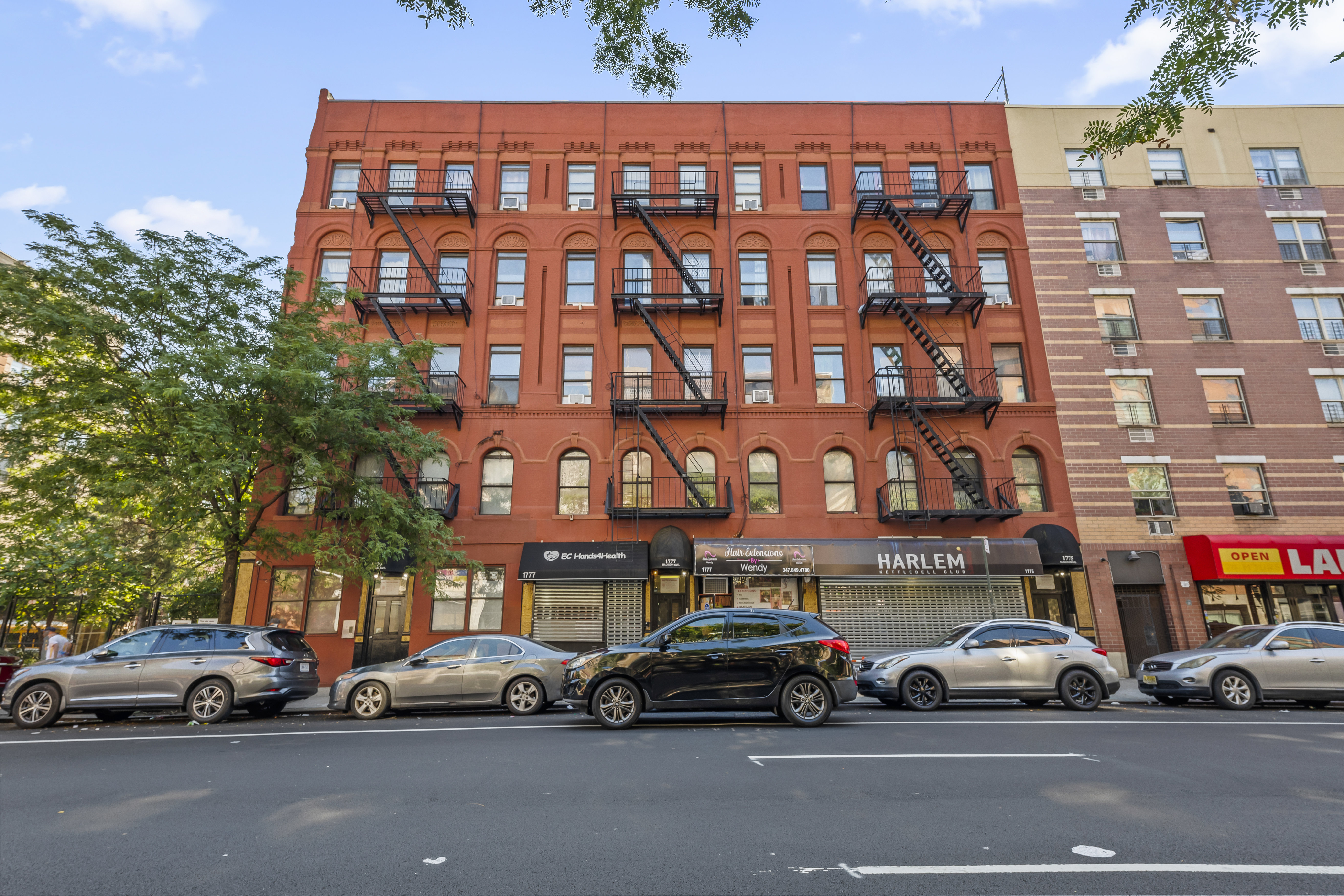 1777 Madison Avenue, Unit 24 Manhattan, NY 10035 - Photo 13 of 20 a view of a car parked in front of a building
