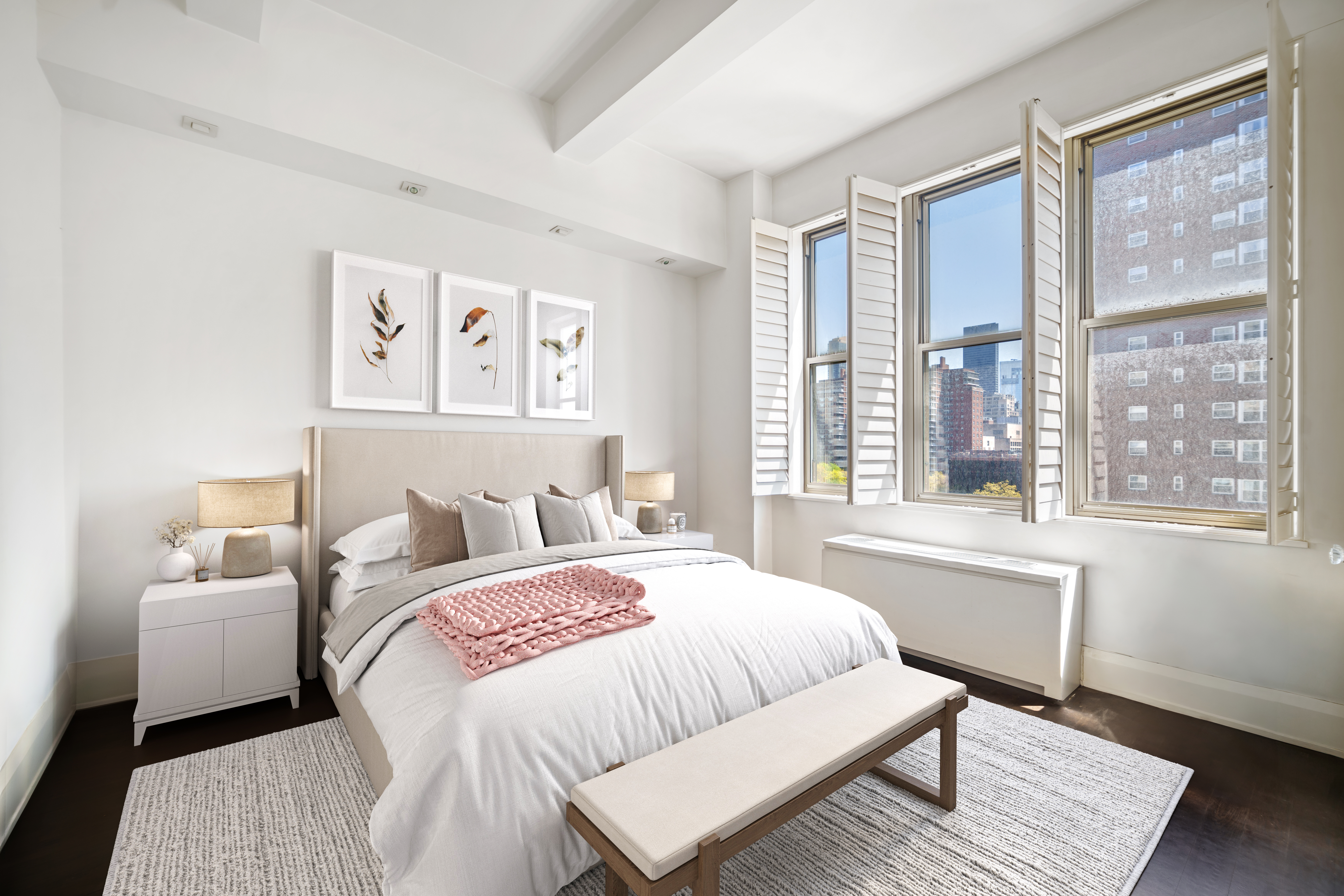 263 9th Avenue, Unit 7A Manhattan, NY 10001 - Photo 4 of 11 a bedroom with a large bed and a large window