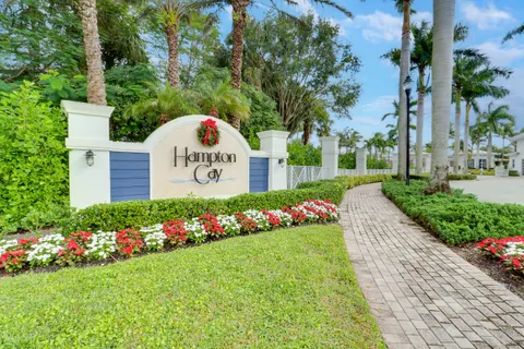 a building with palm trees in front of it