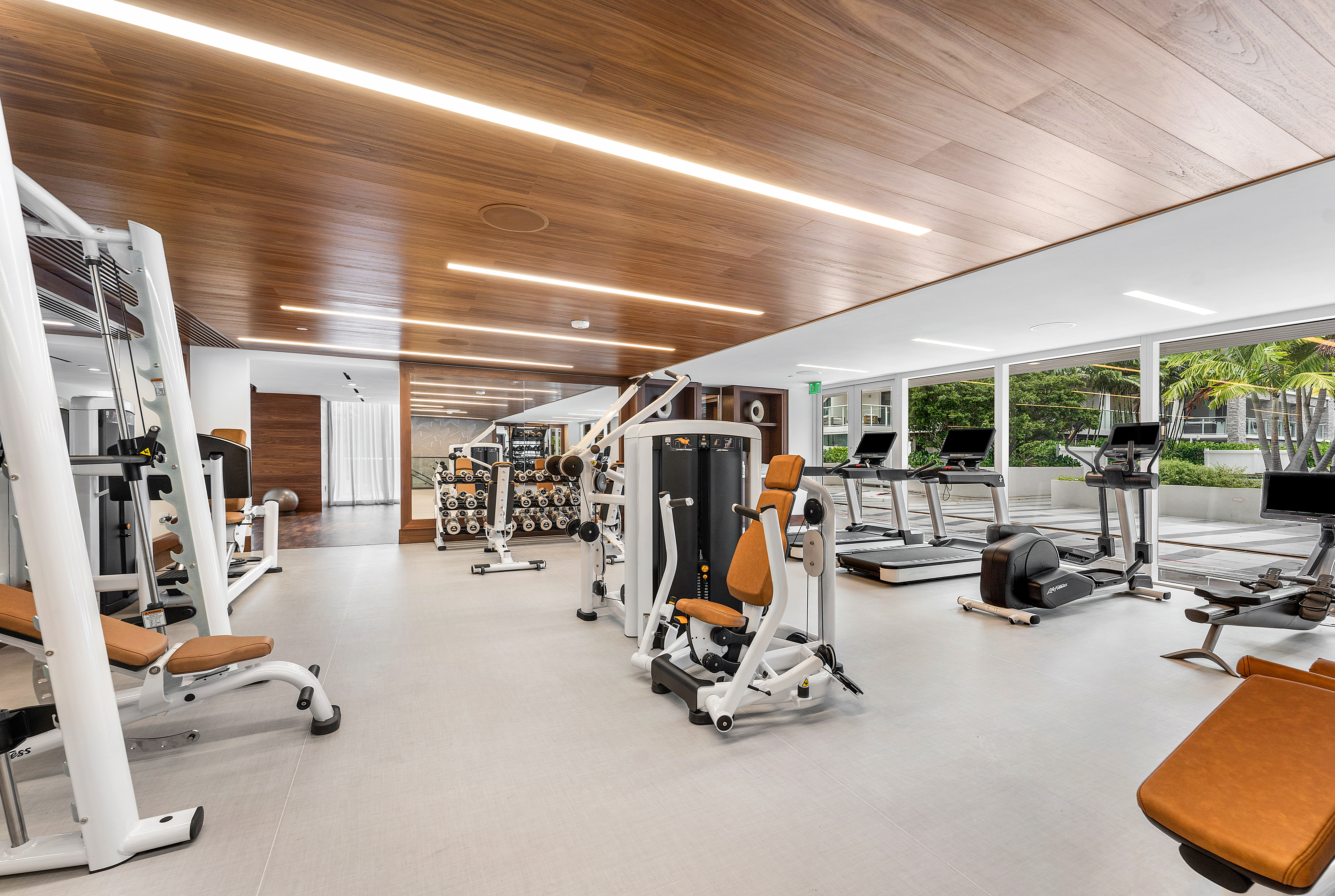 210 Southeast Mizner Boulevard, Unit 101 Boca Raton, FL 33432 - Photo 10 of 31 a view of a room with gym equipment