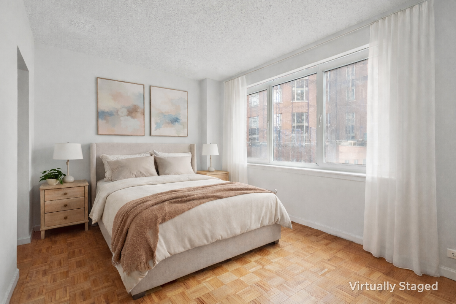 a bedroom with a bed and window