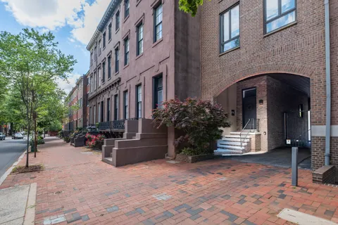 a living room with furniture and a table