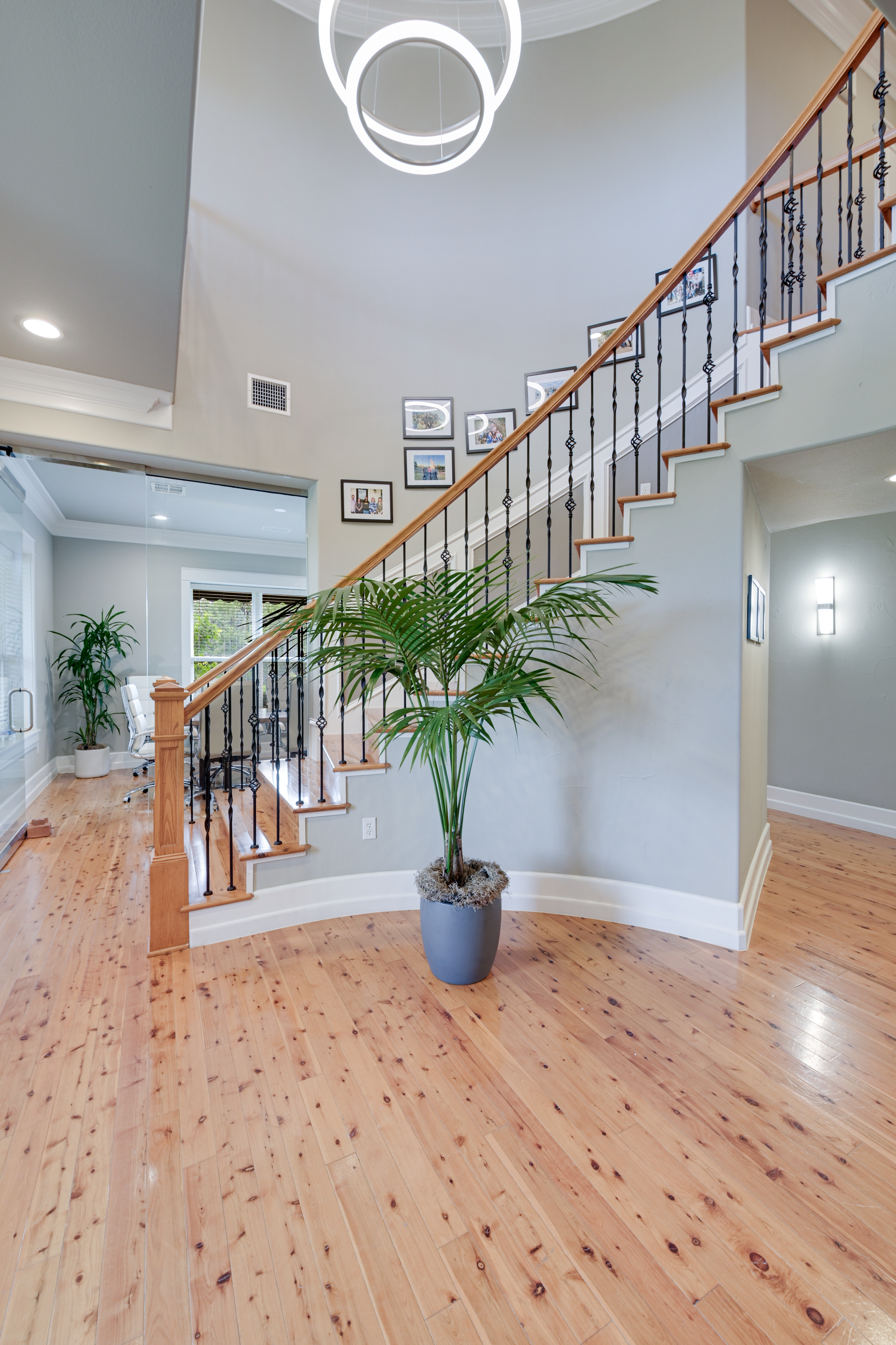 14913 Murfin Road Austin, TX 78734 - Photo 5 of 40 a view of staircase with lots of wooden floor