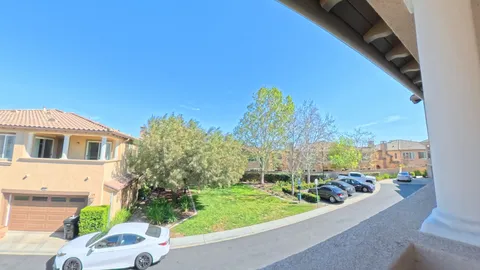 a view of a street in front of a building