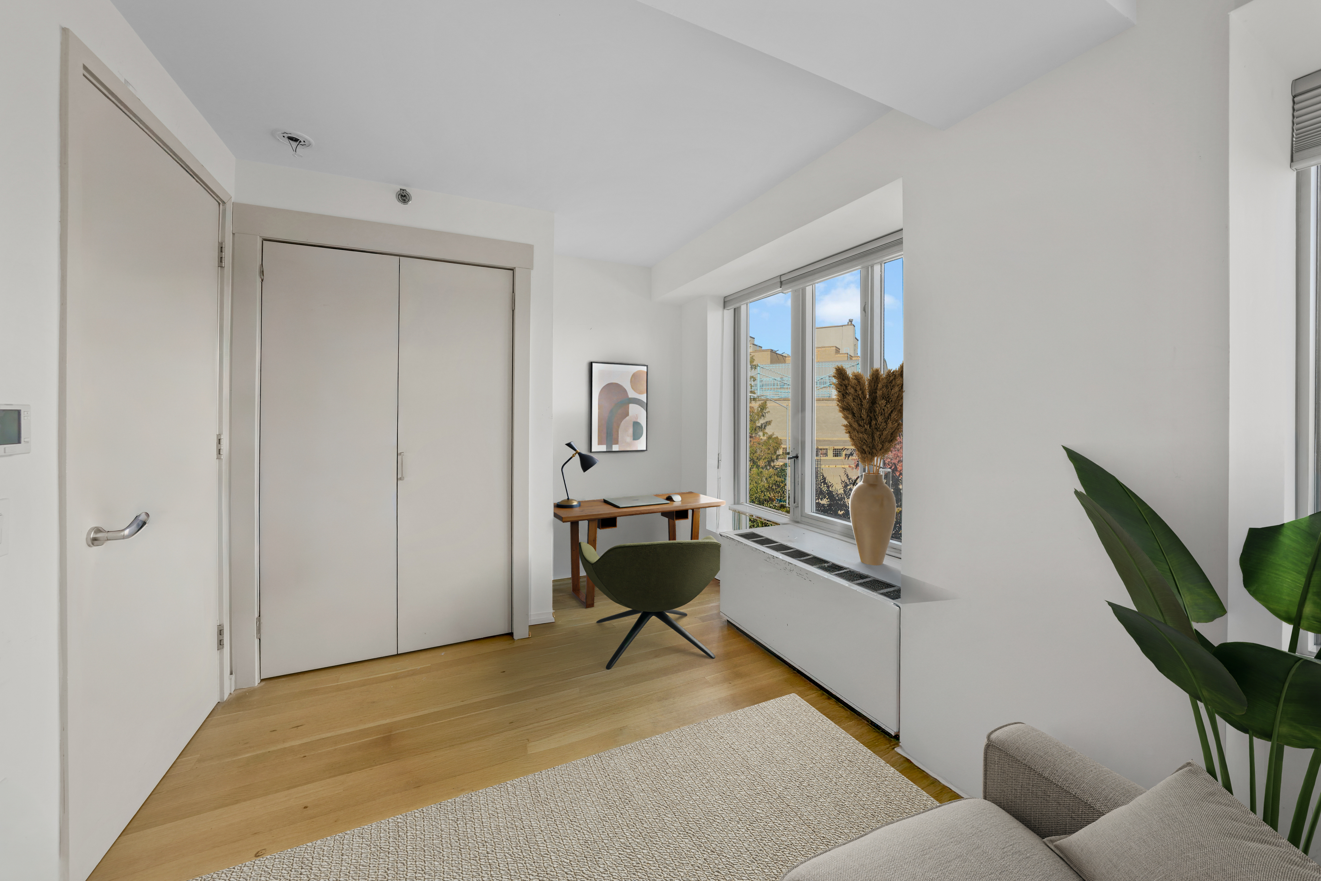 448 West 167th Street, Unit 3E Manhattan, NY 10032 - Photo 13 of 24 a living room with furniture