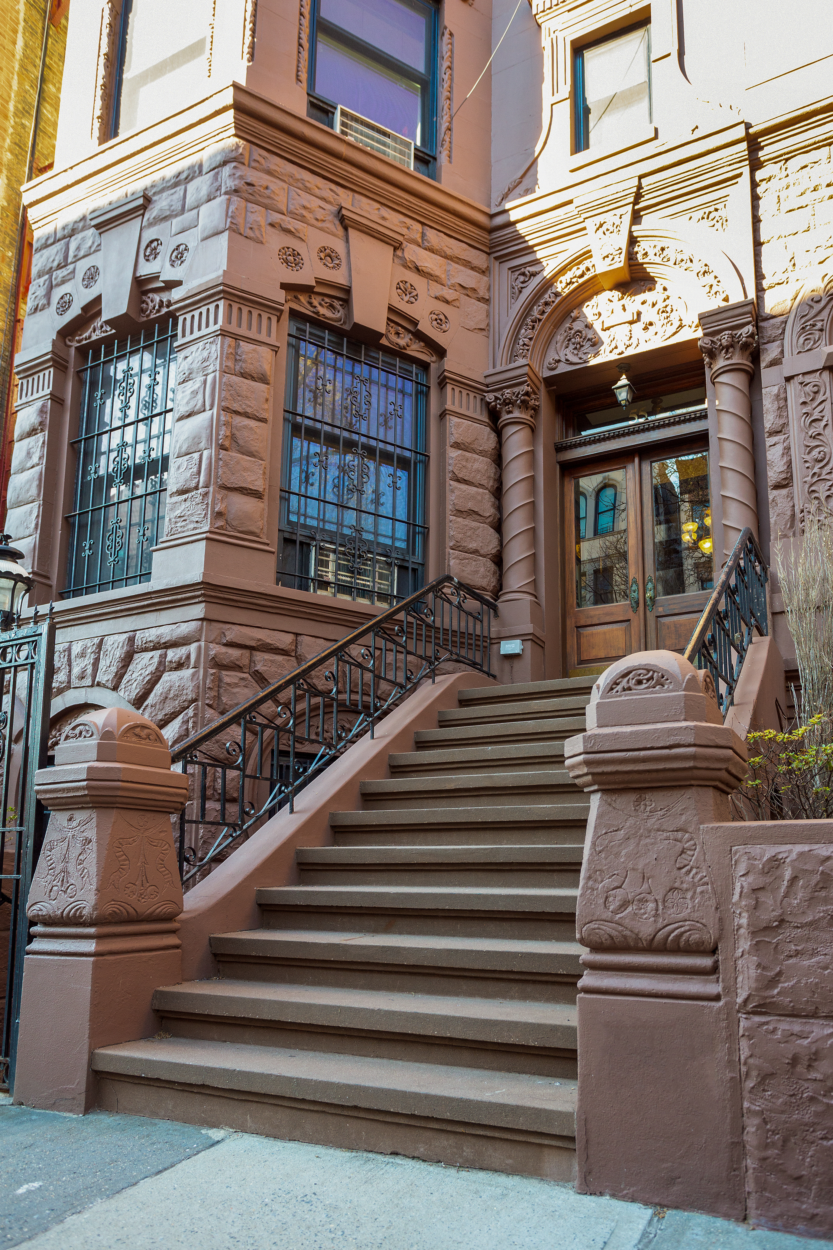 55 West 84th Street, Unit 5 Manhattan, NY 10024 - Photo 7 of 8 a view of a building with car parked