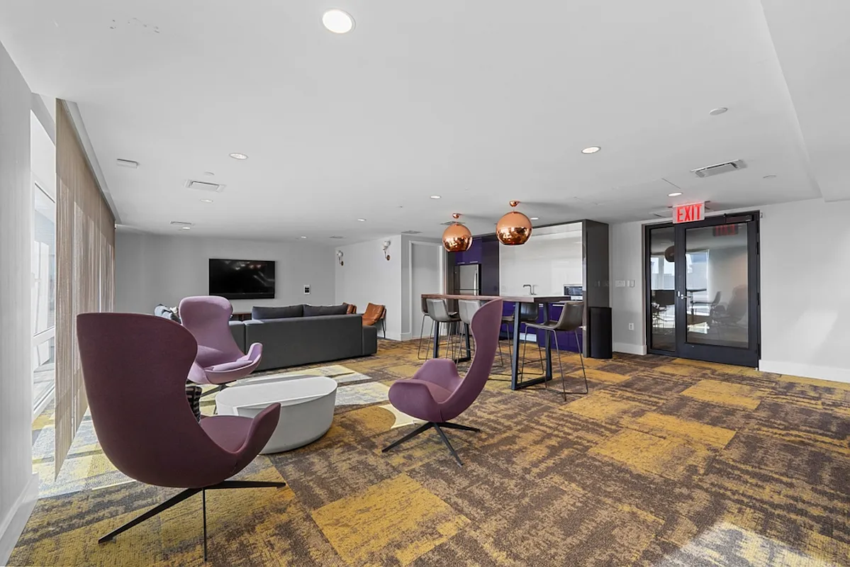 350 Clarkson Avenue, Unit 723 Brooklyn, NY 11226 - Photo 7 of 24 a living room with furniture and a wooden floor