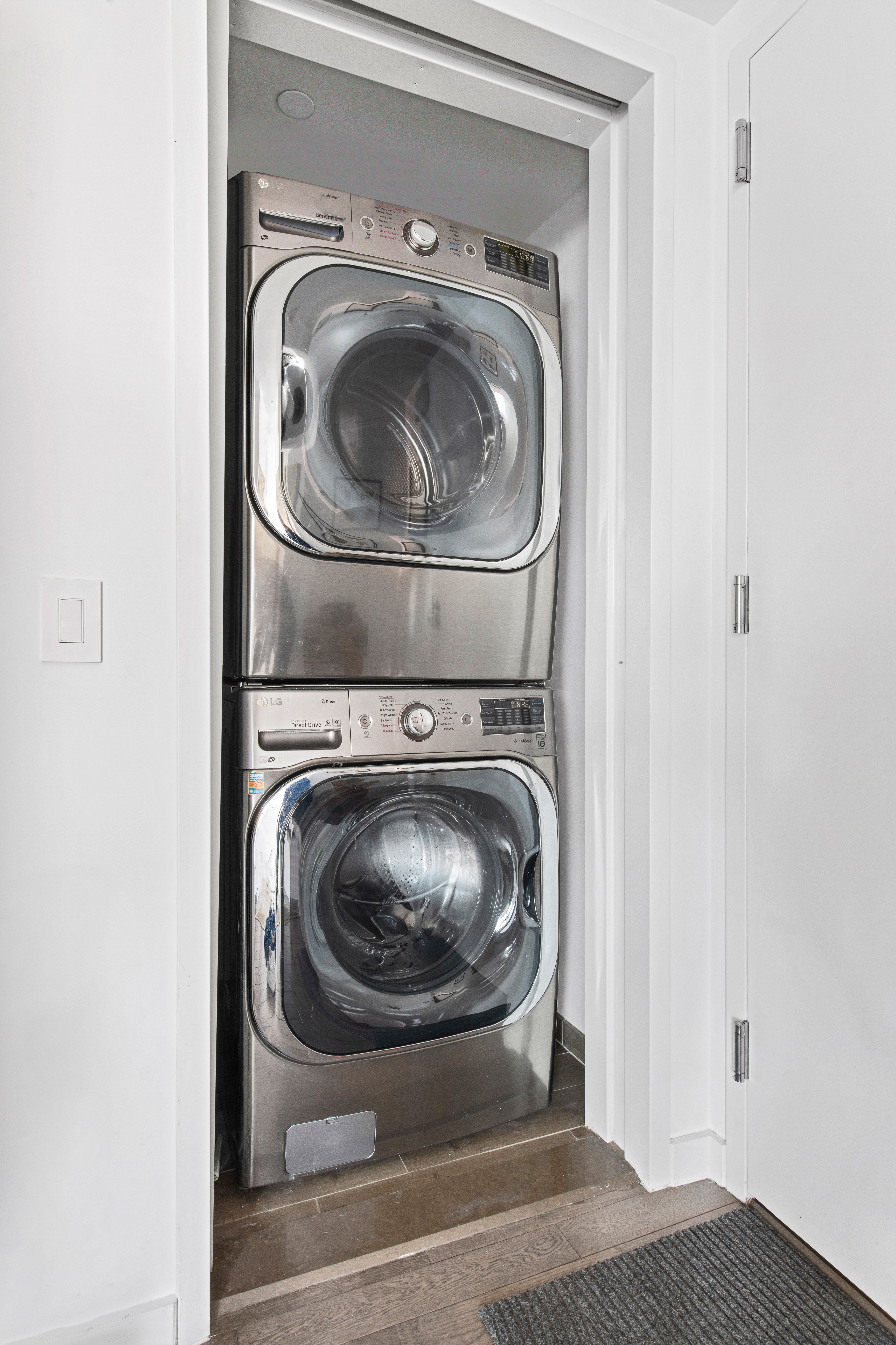 285 West 110th Street, Unit 4B Manhattan, NY 10026 - Photo 9 of 14 a utility room with dryer and washer