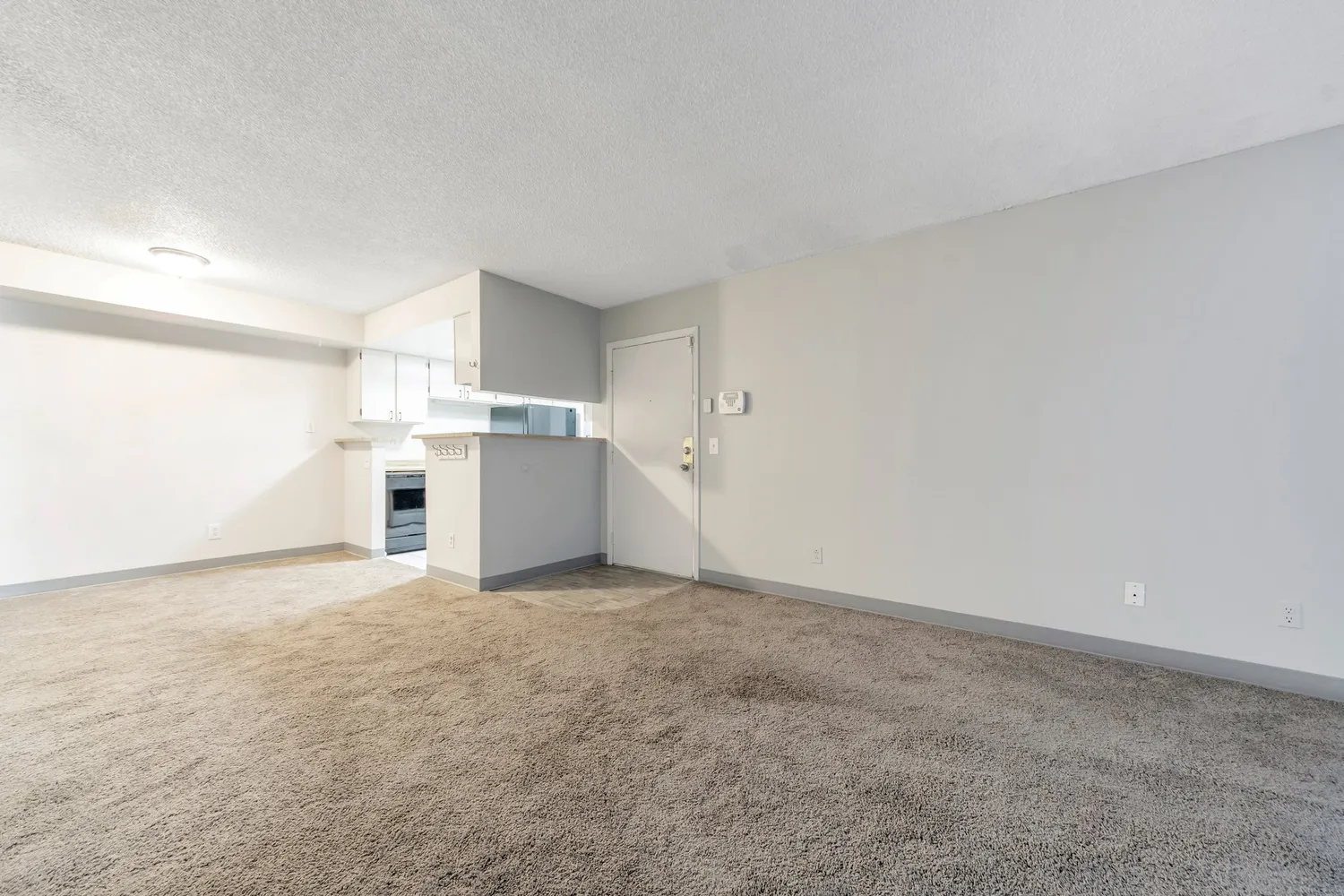 a view of a kitchen with a sink
