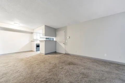 a view of a kitchen with a sink