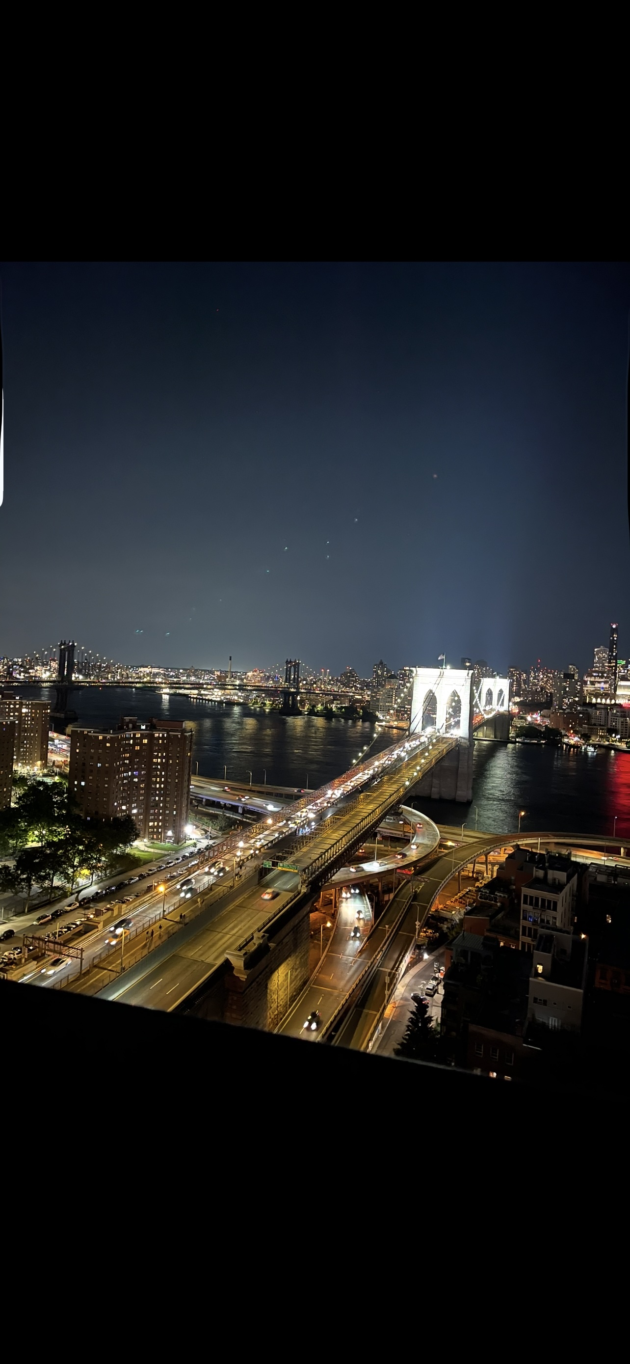 333 Pearl Street, Unit 26M Manhattan, NY 10038 - Photo 9 of 15 a view of a couch in a room