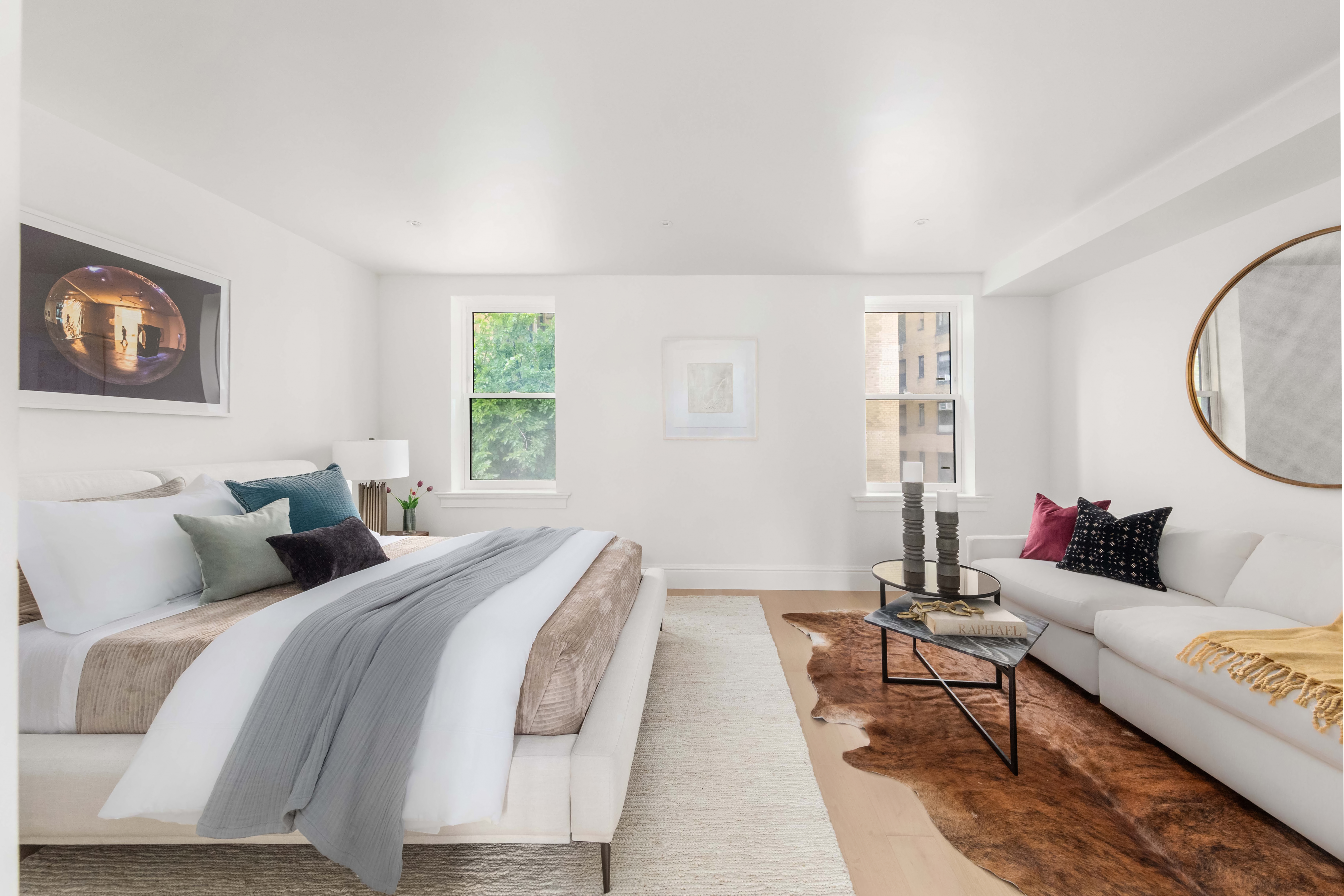 344 West 84th Street, Unit PH Manhattan, NY 10024 - Photo 8 of 11 a living room with a couch and a window