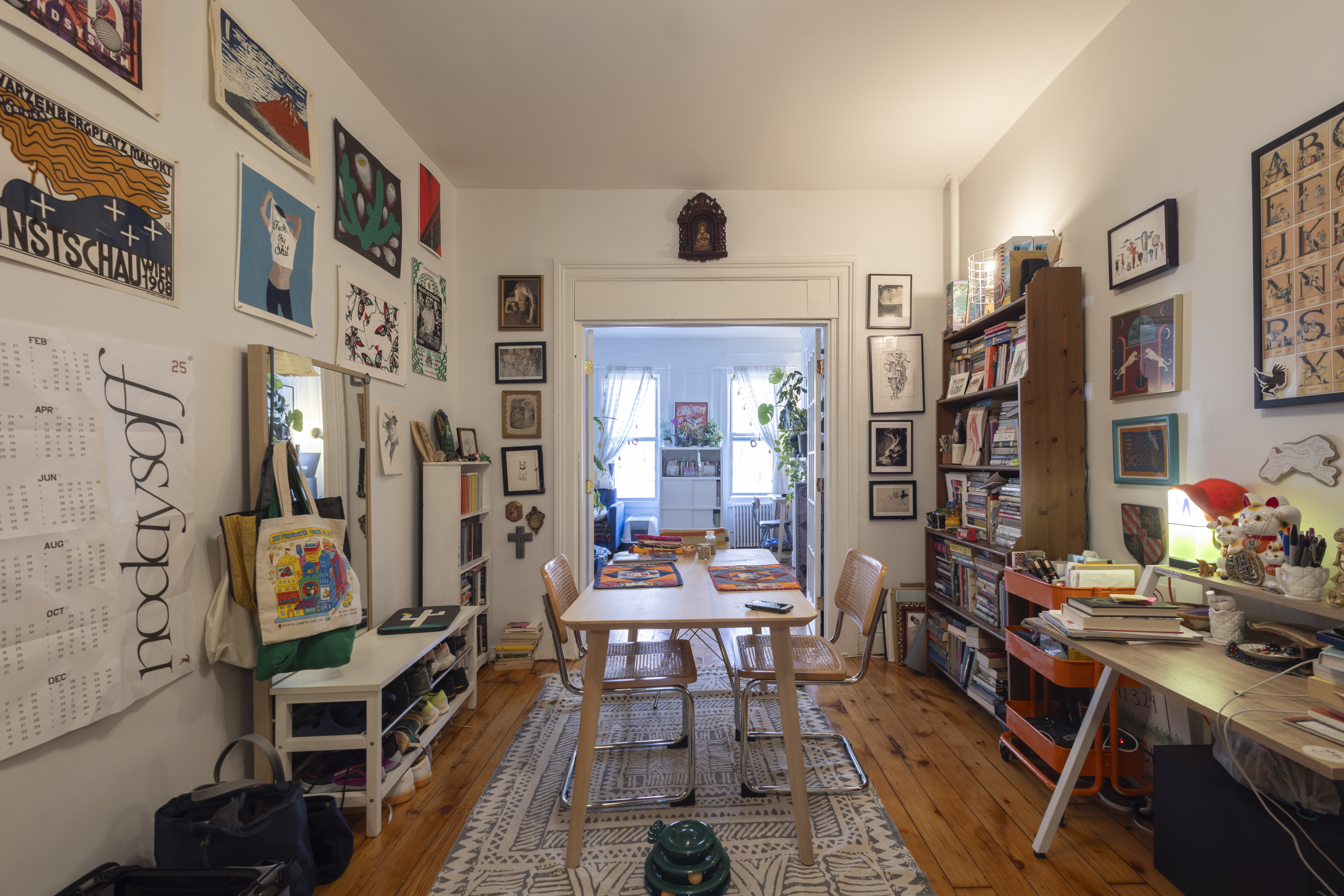 40 A Jewel Street Brooklyn, NY 11222 - Photo 8 of 18 a living room with furniture a bookshelf and a window