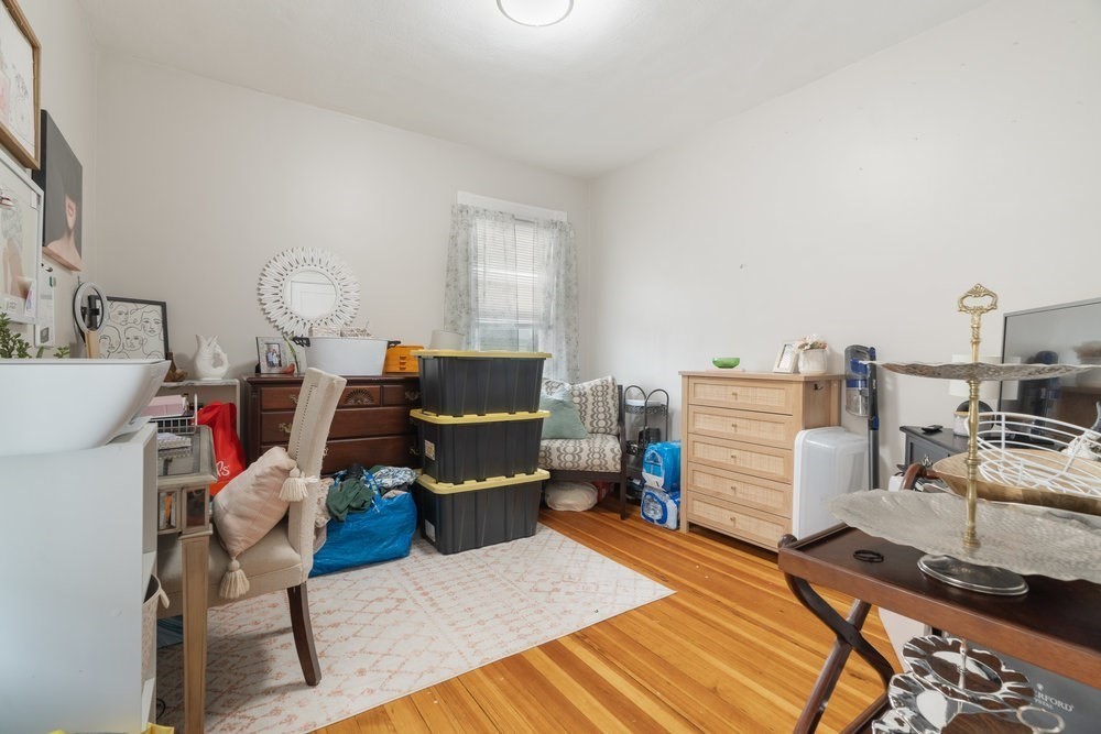 24 Buttonwood Street Boston, MA 02125 - Photo 9 of 43 a workspace with furniture