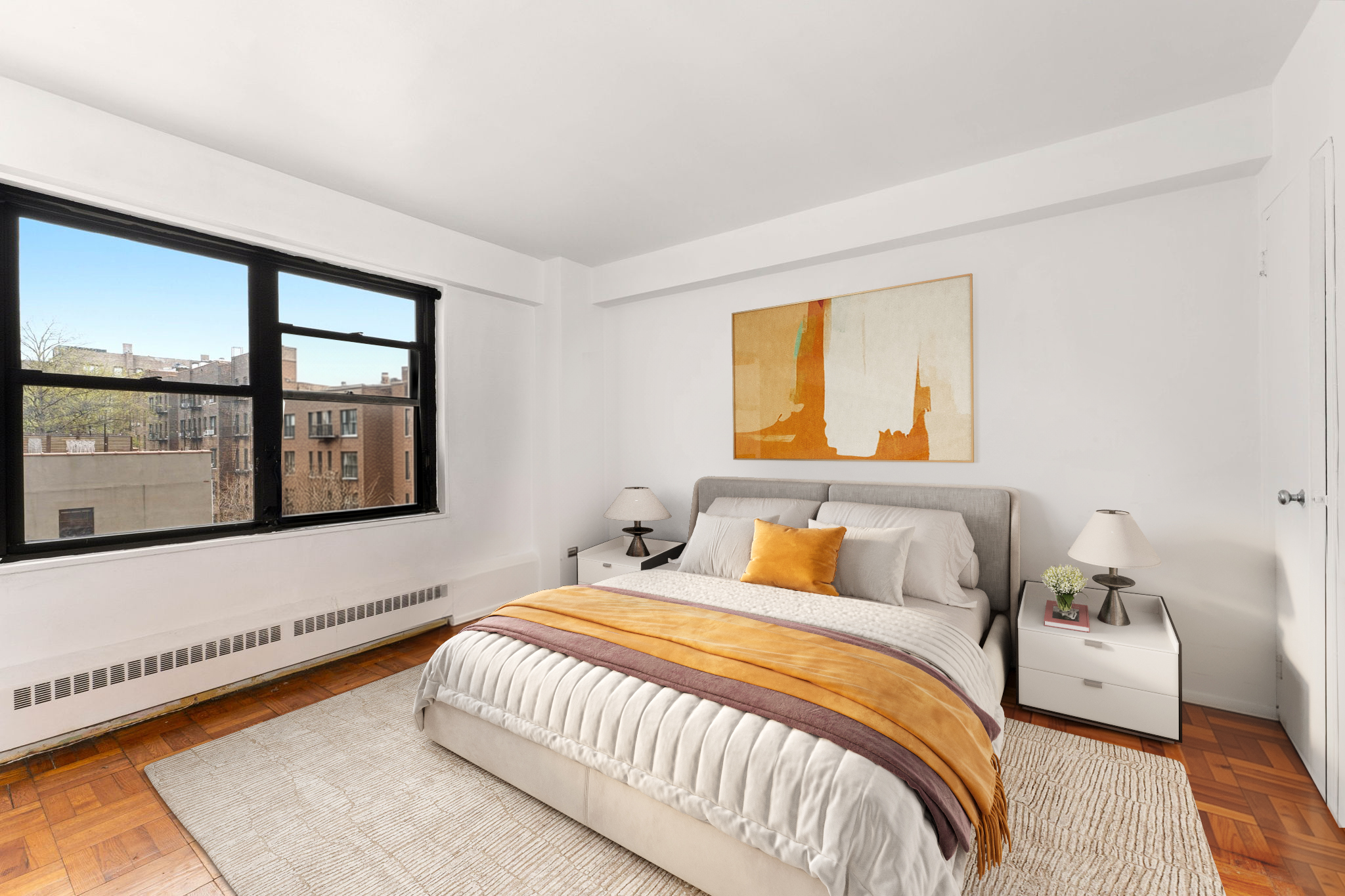 345 West 145th Street, Unit 5A1 Manhattan, NY 10032 - Photo 3 of 9 a bedroom with a bed and window