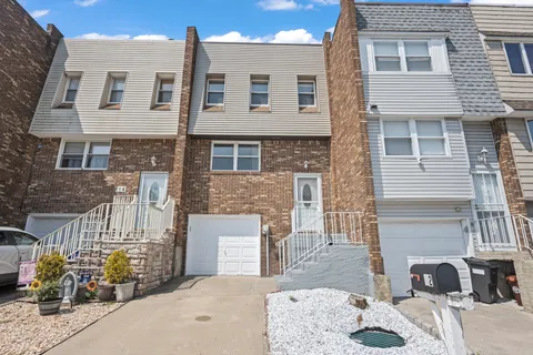 a front view of a house with patio