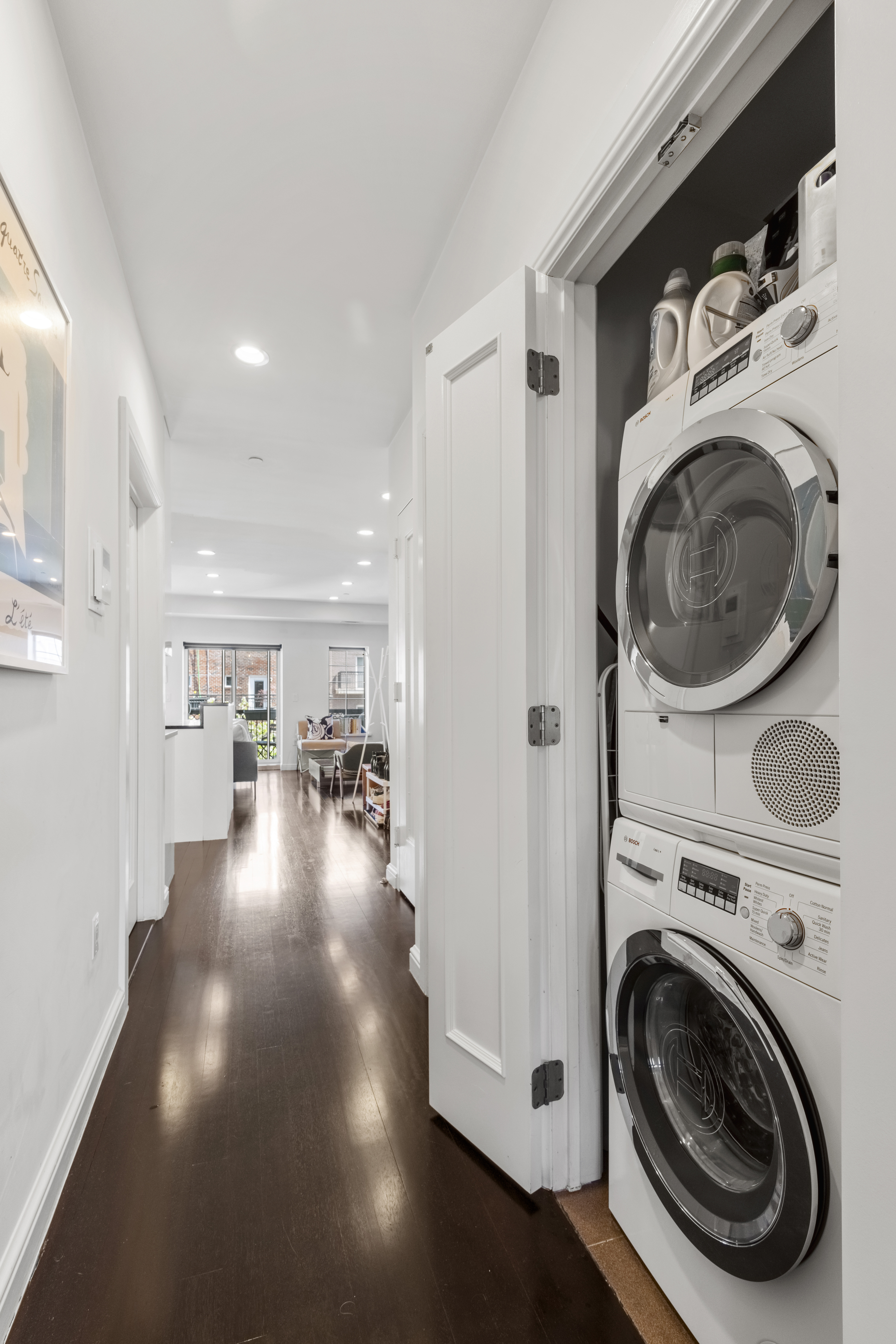347 3rd Street, Unit C4A Brooklyn, NY 11215 - Photo 10 of 11 a view of a hallway with washer and dryer