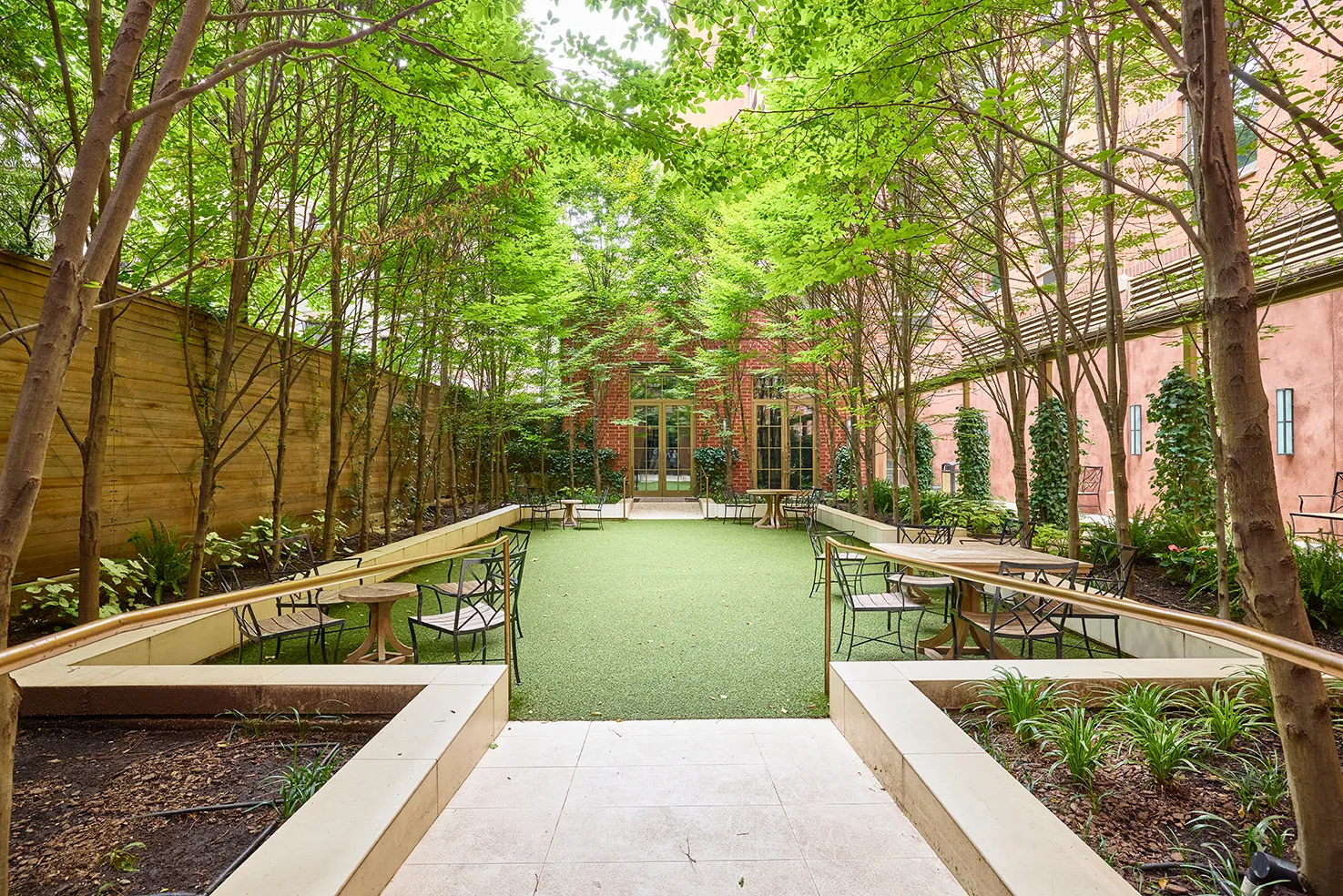 a view of swimming pool with chairs in outdoor space