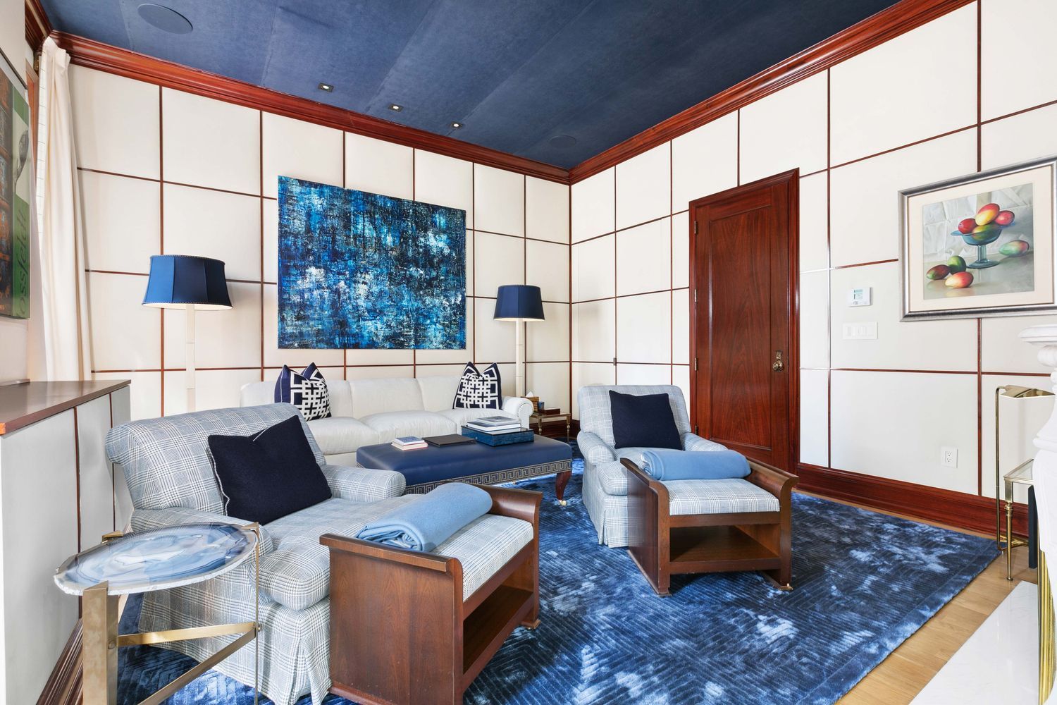 1 Central Park South, Unit 909913 Manhattan, NY 10019 - Photo 21 of 38 a living room with furniture and a rug