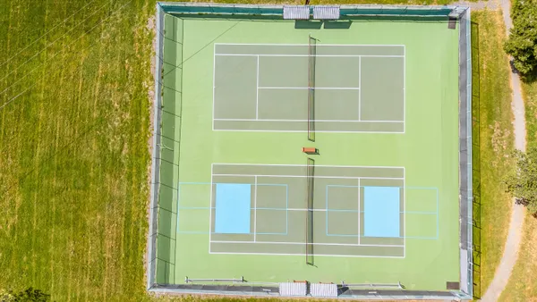 a green door in front of a door