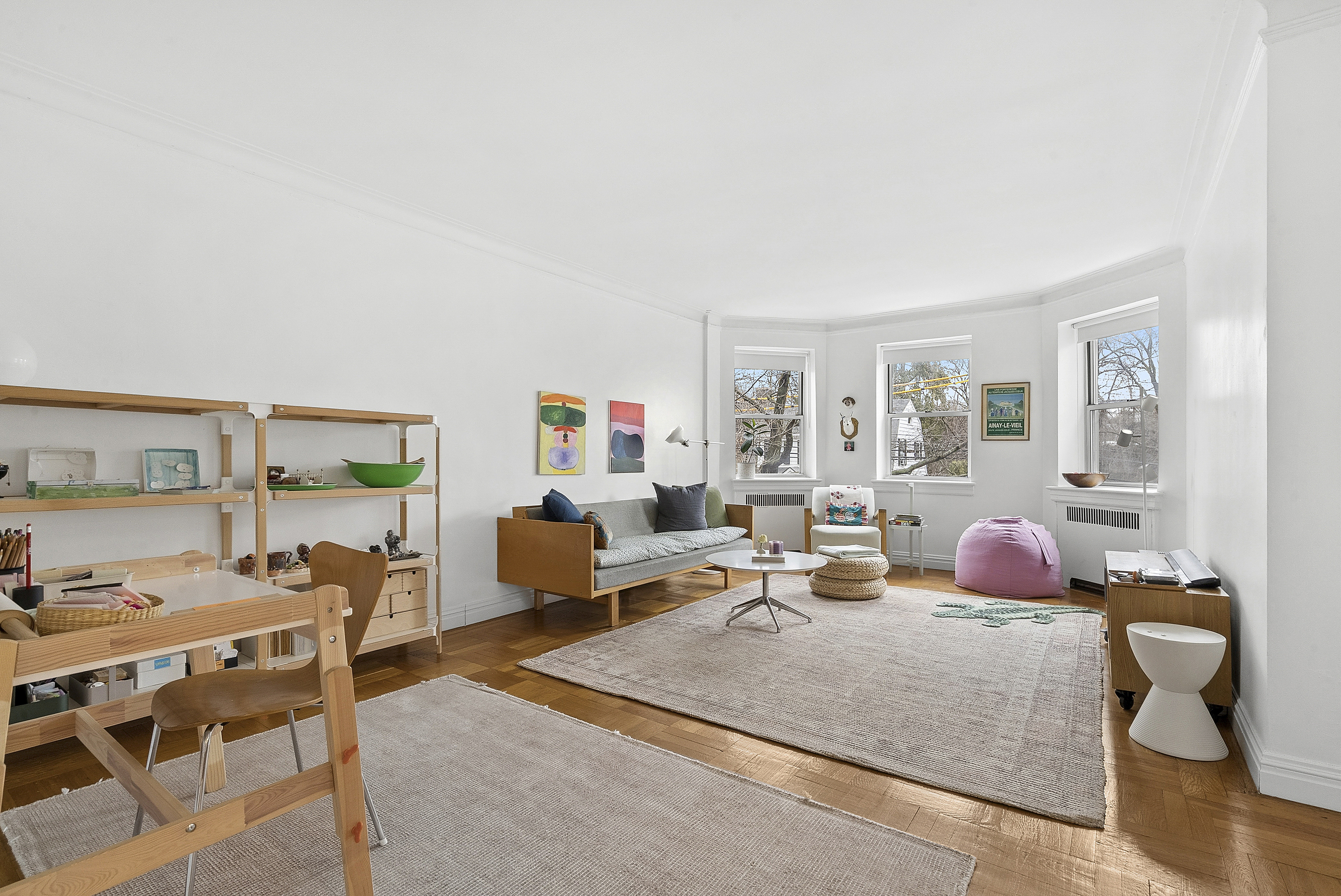 a bedroom with furniture and a window