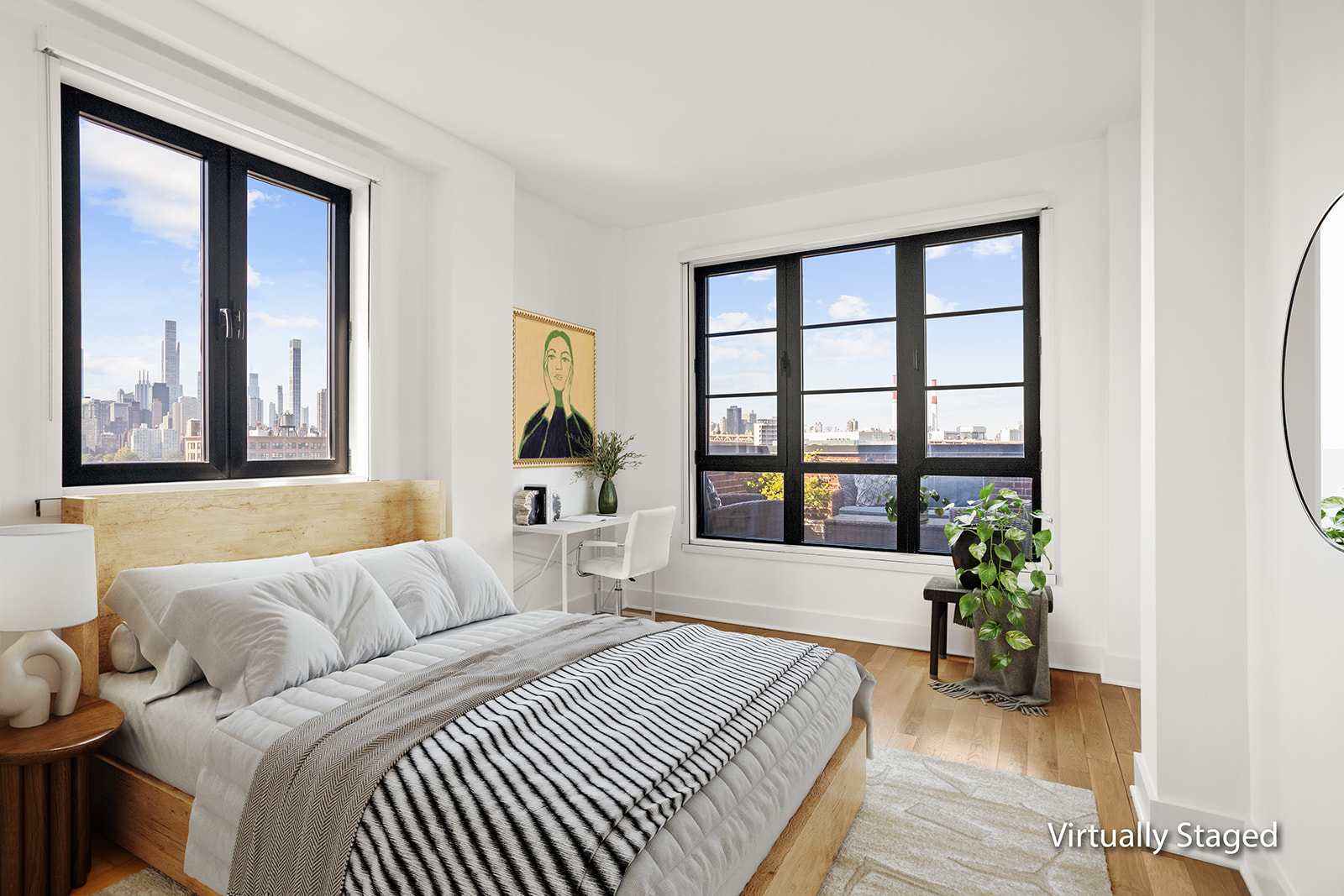 21-10 44th Drive, Unit PHA Queens, NY 11101 - Photo 8 of 18 a bedroom with a bed and a large window