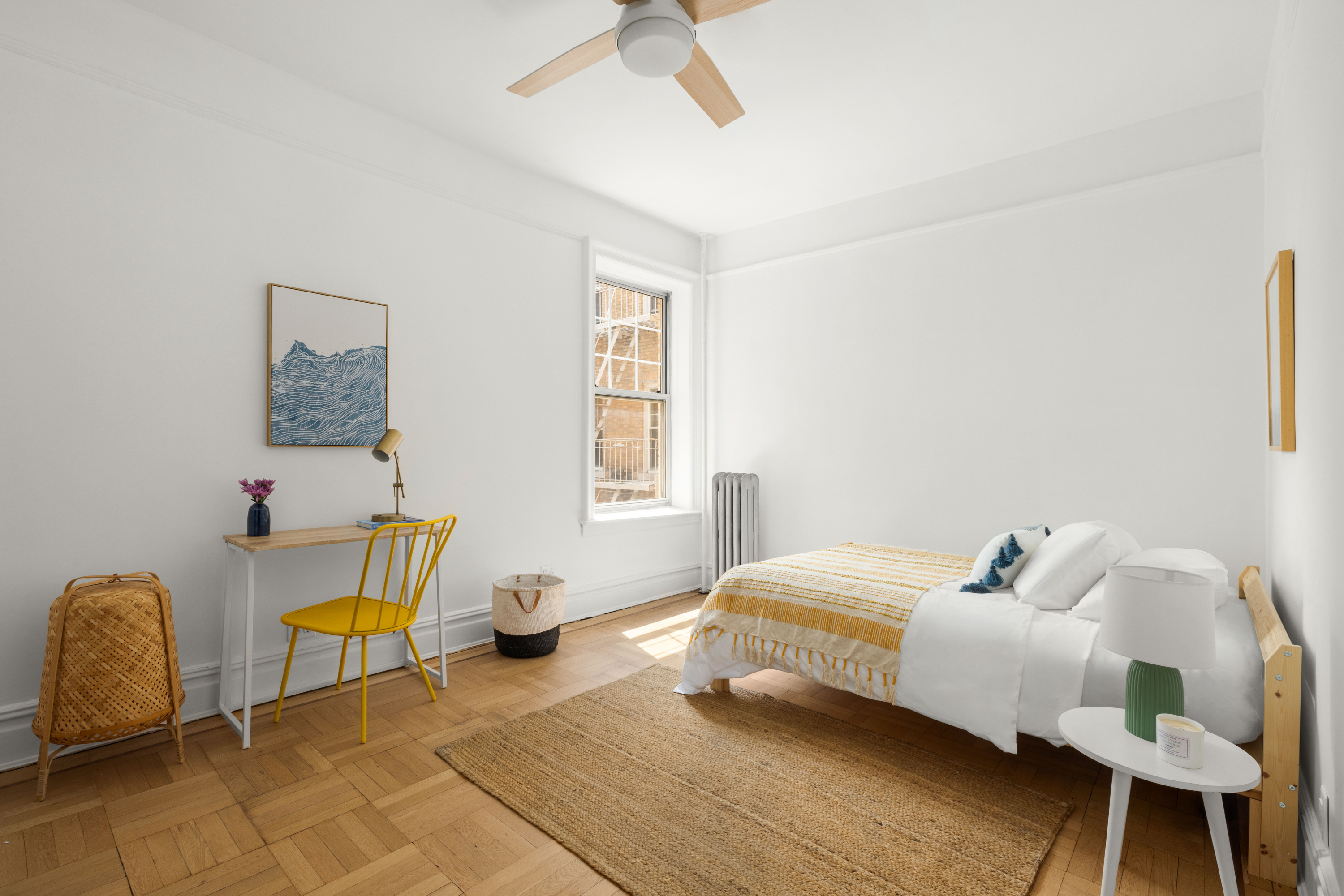 759 42nd Street, Unit 14 Brooklyn, NY 11232 - Photo 6 of 9 a bedroom with a bed a couch and dresser