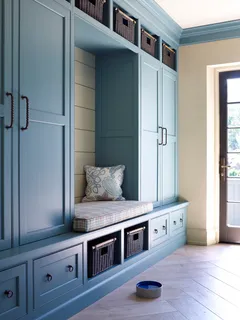 a kitchen with a table and chair
