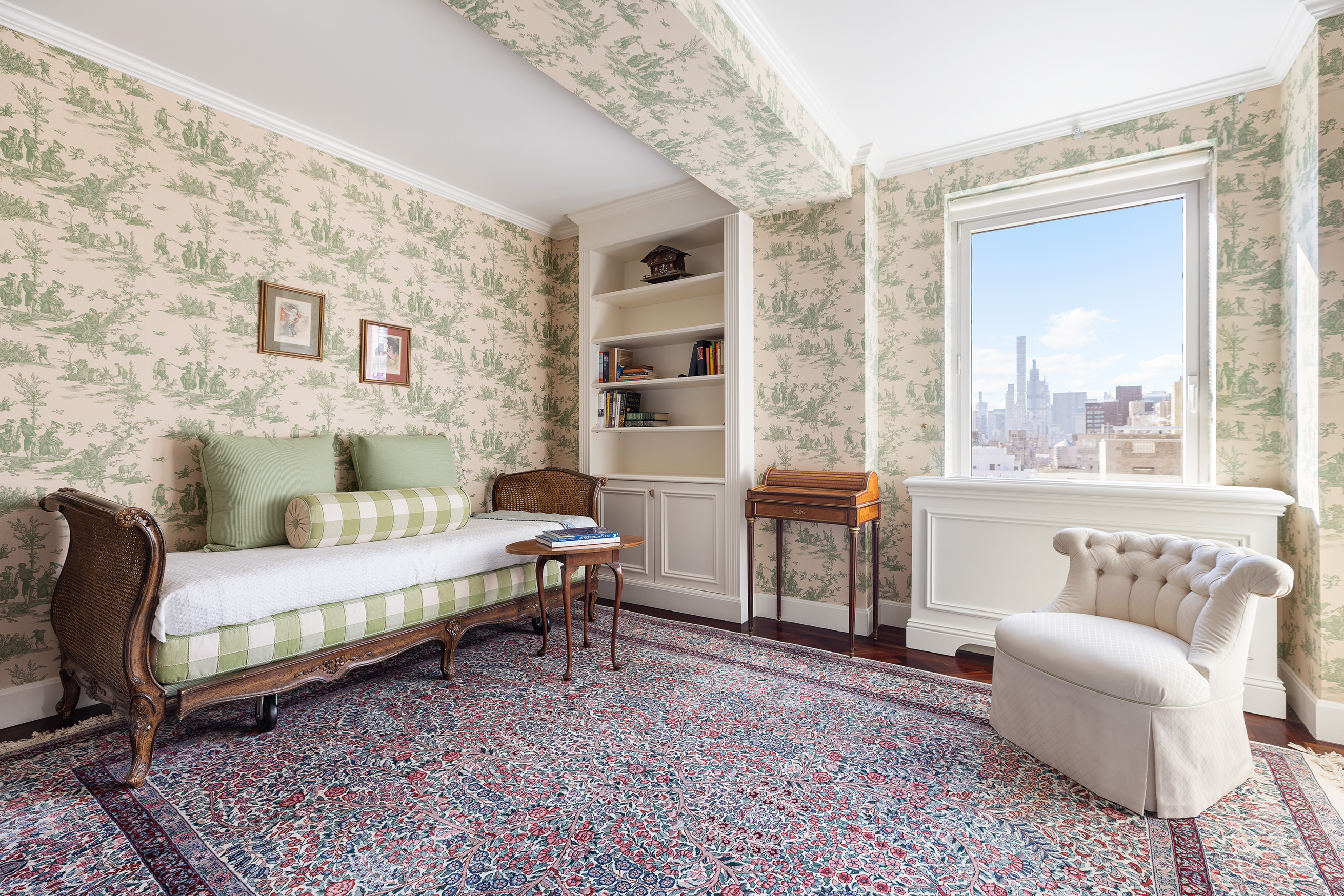 1049 5th Avenue, Unit 17A Manhattan, NY 10028 - Photo 9 of 11 a bedroom with furniture and a window