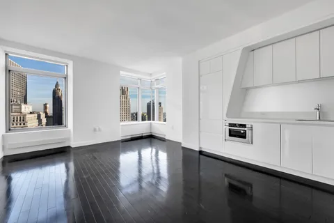 a view of livingroom with furniture and wooden floor