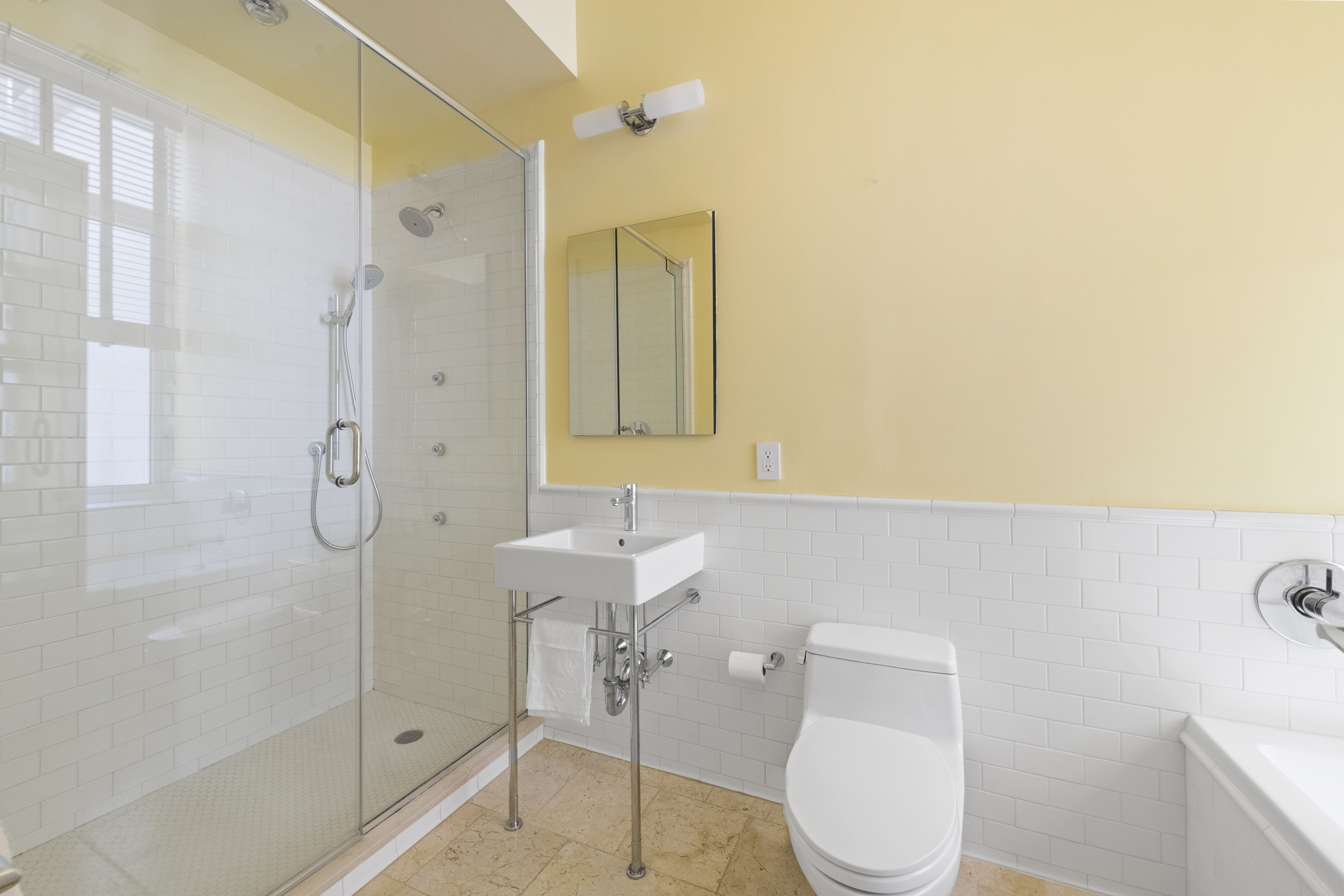 60 Collister Street, Unit 1B Manhattan, NY 10013 - Photo 10 of 20 a bathroom with a toilet and shower
