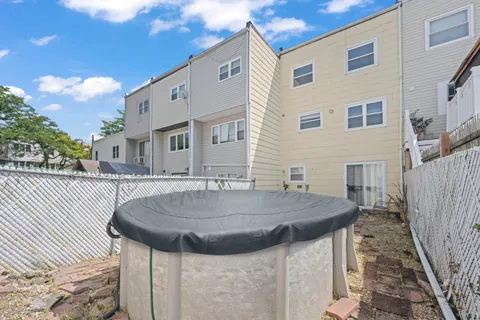 a view of dinning table and chairs in the patio