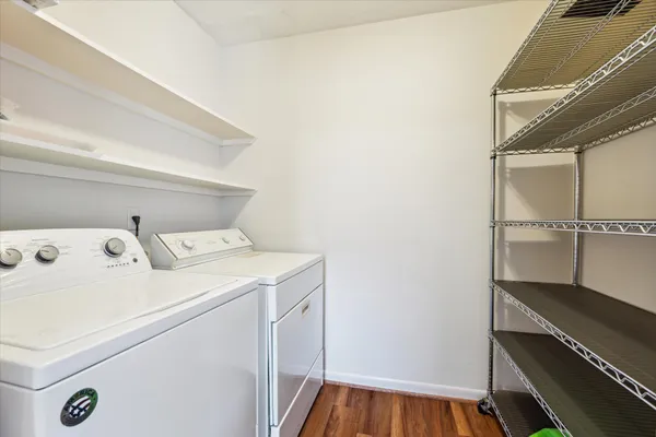 a view of storage and utility room with washer and dryer